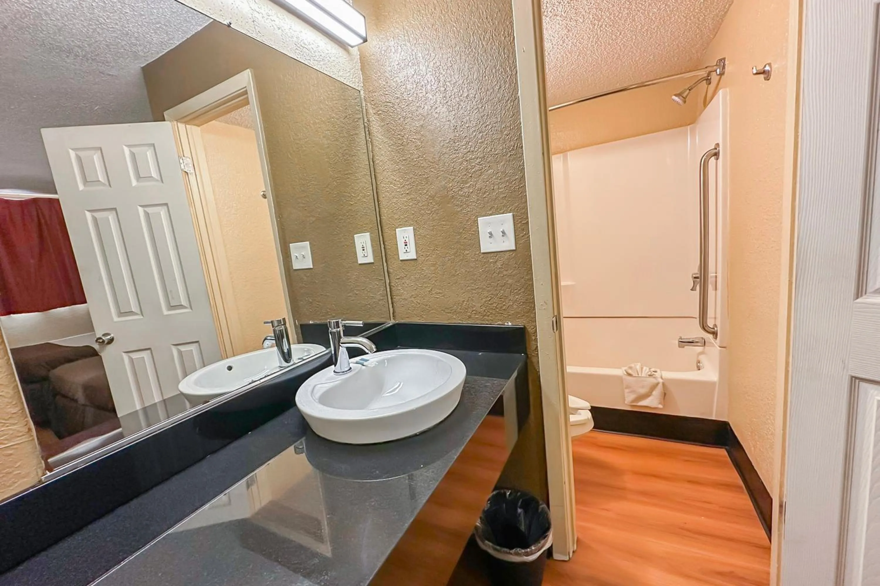 Bathroom in OYO Hotel Mobile, AL I-65 at Airport Blvd