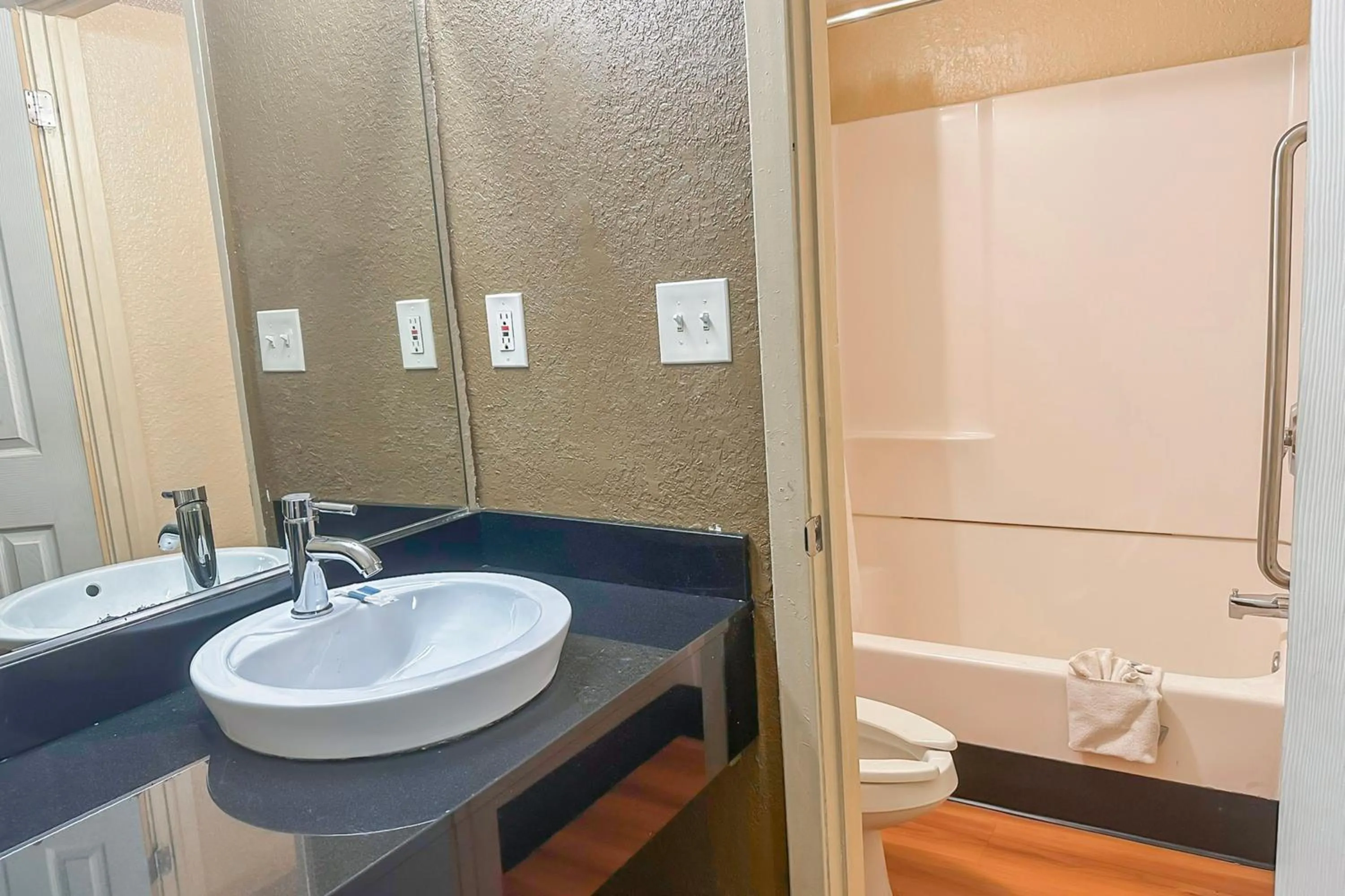 Bathroom in OYO Hotel Mobile, AL I-65 at Airport Blvd