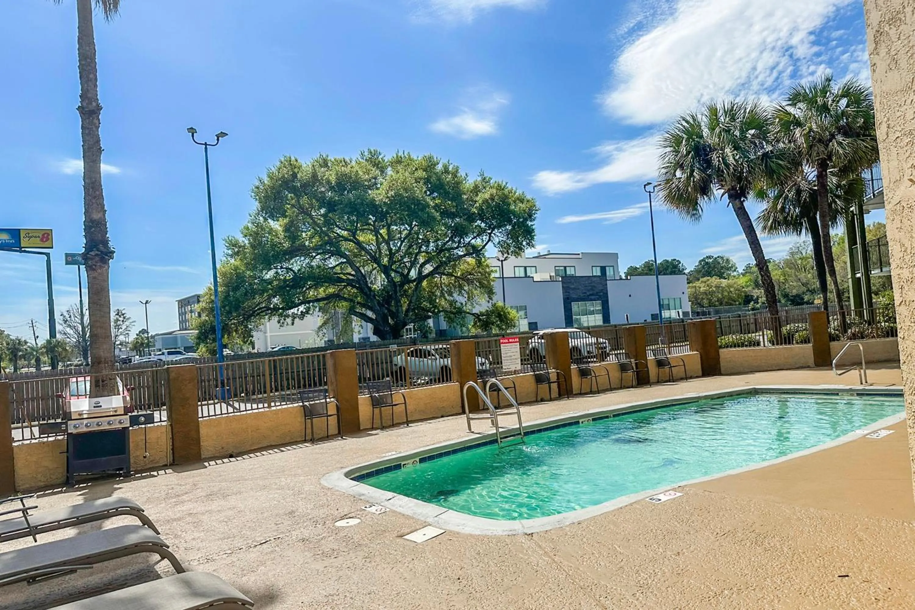 Swimming pool in OYO Hotel Mobile, AL I-65 at Airport Blvd