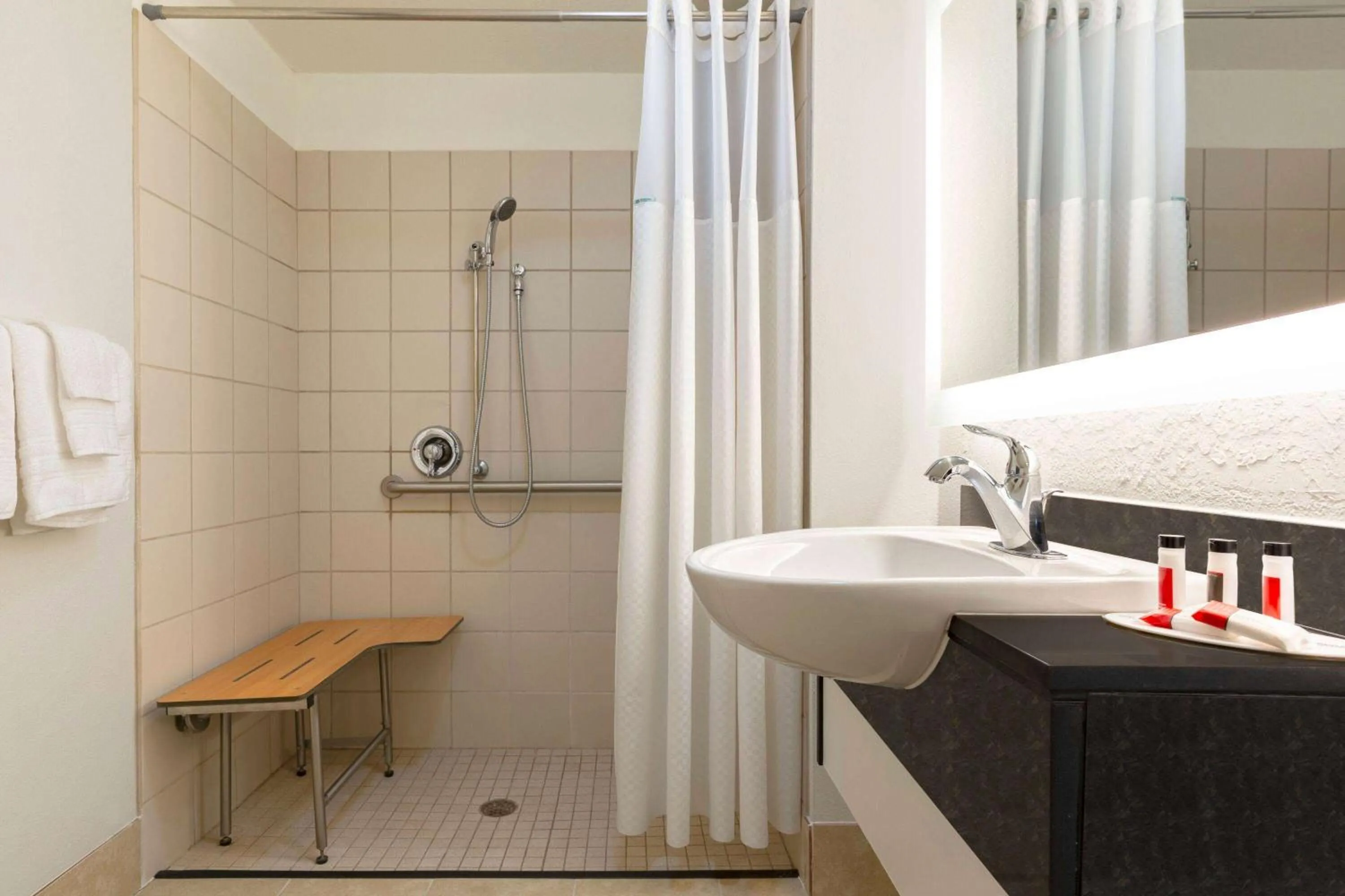 Bathroom in Howard Johnson by Wyndham Harrisonburg