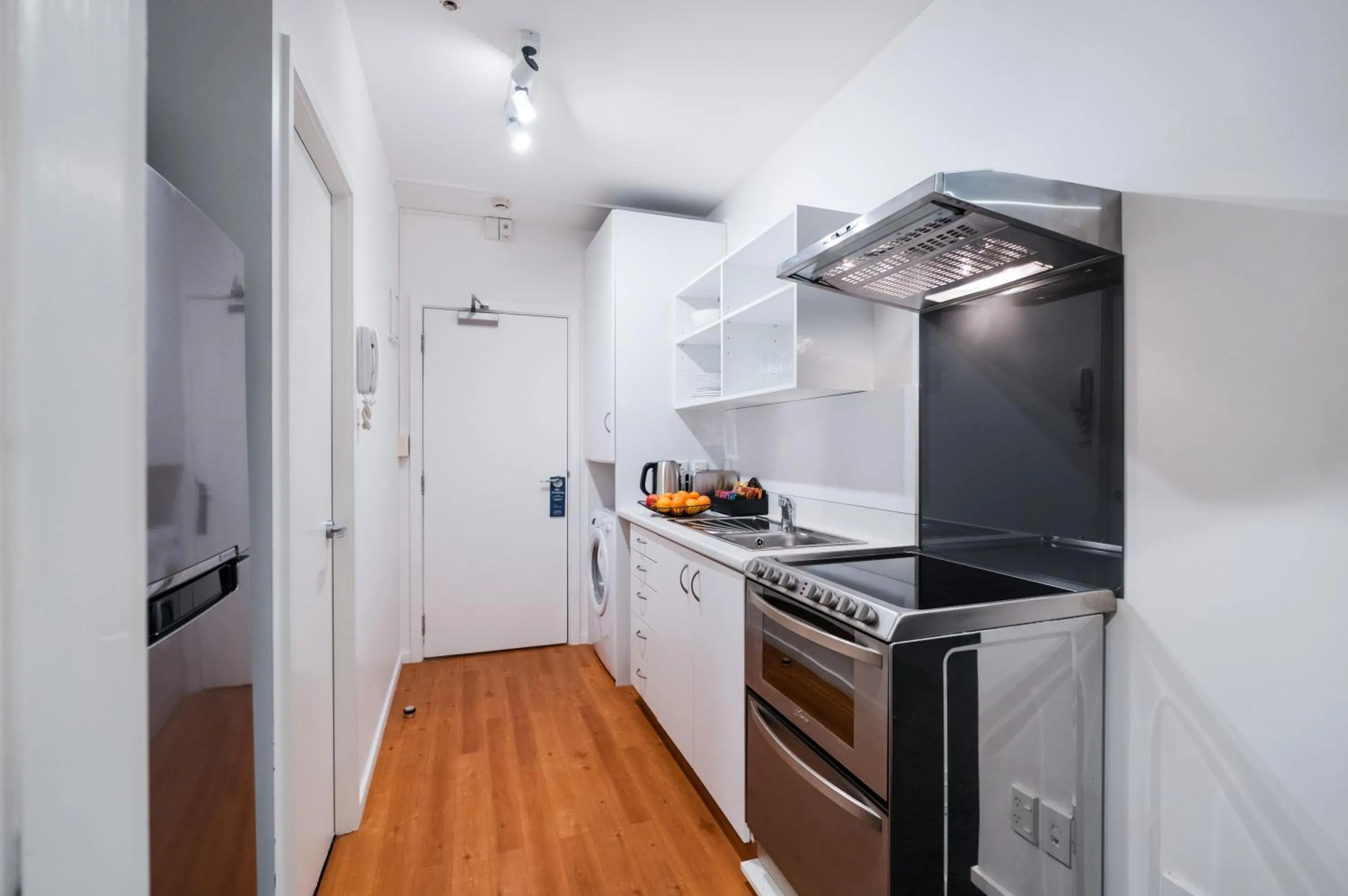 Kitchen or kitchenette in Gilmer Apartment Hotel