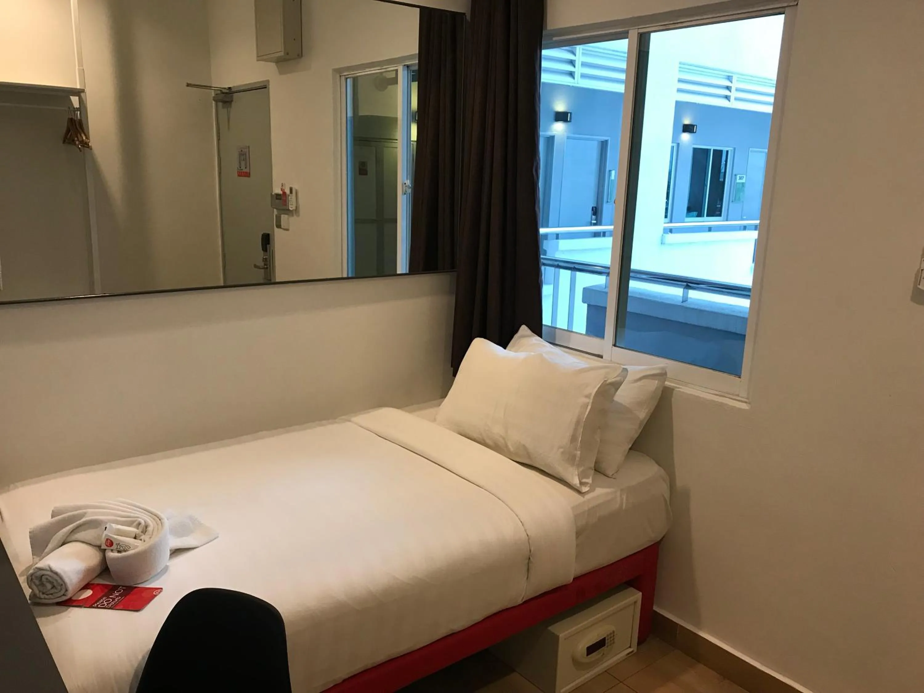 Photo of the whole room, Bed in Tune Hotel KLIA Aeropolis (Airport Hotel)