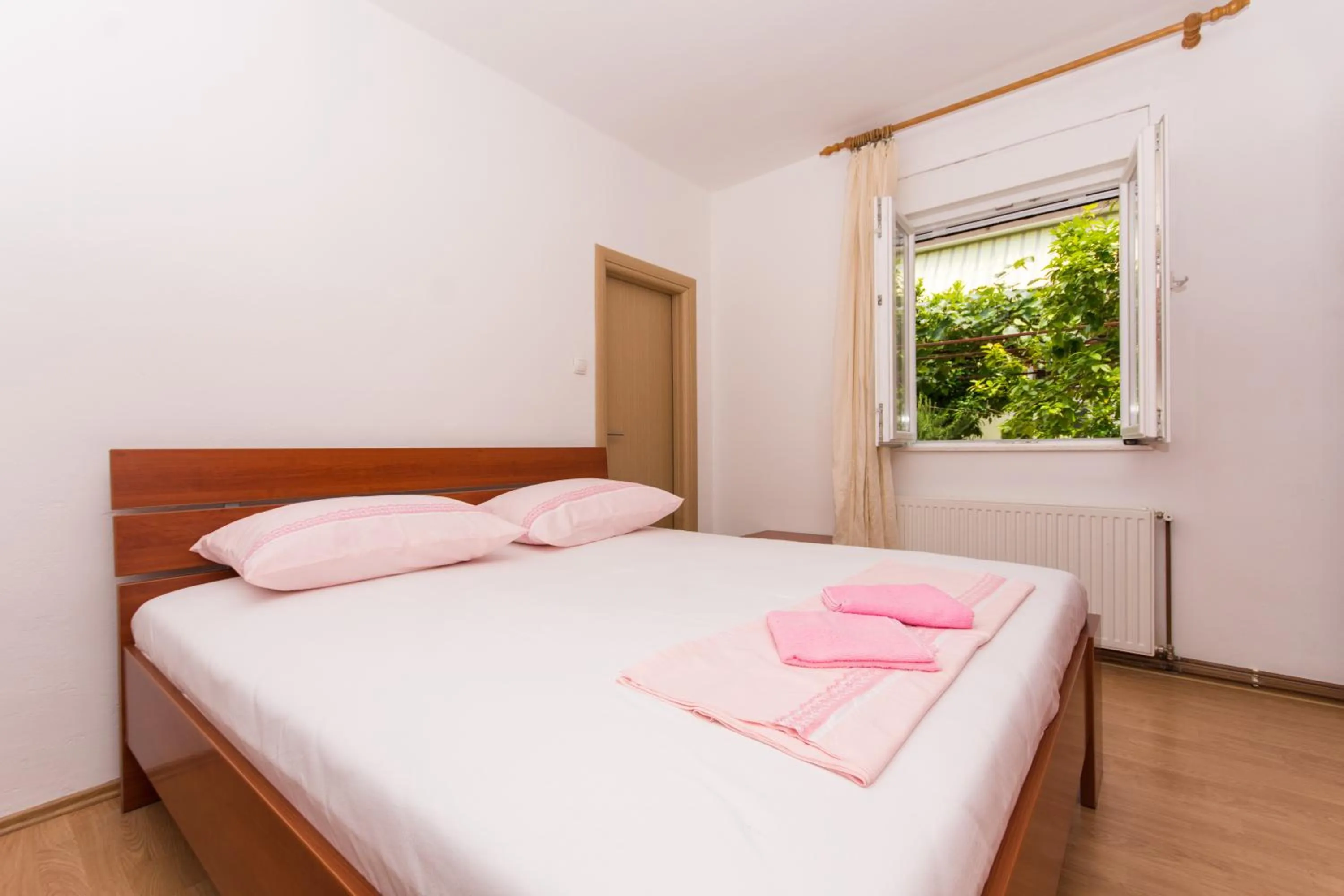 Bed in Apartments Ploka