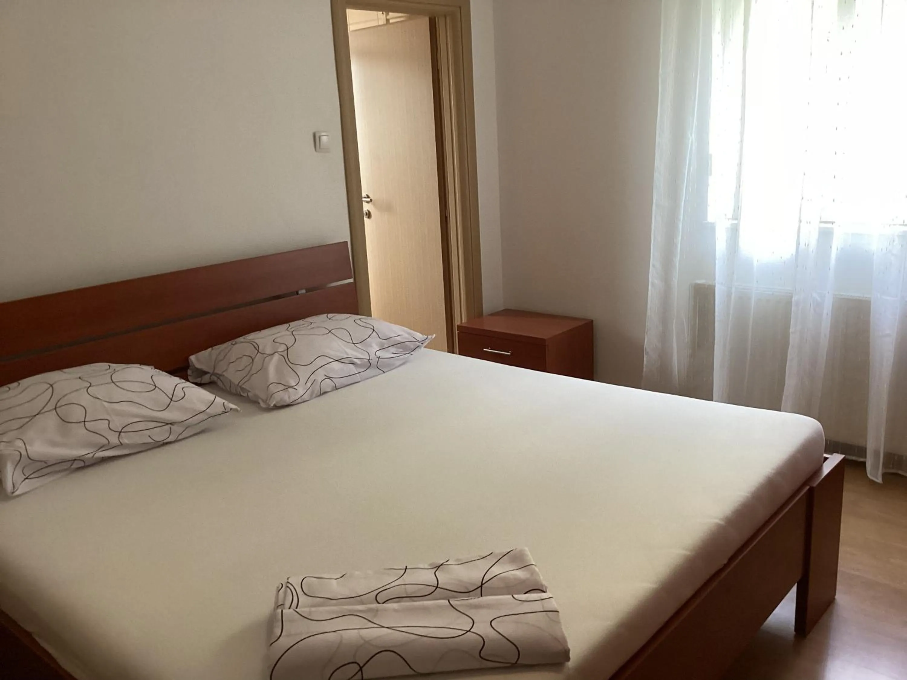 Bed in Apartments Ploka