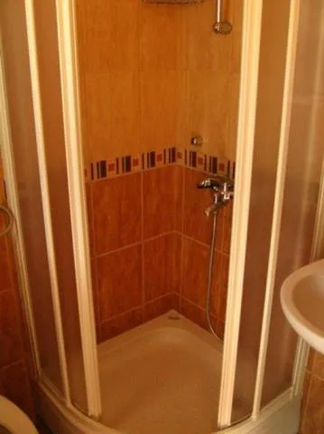 Bathroom in ROOMS & APARTMENTS DOBROTSKI DVORI