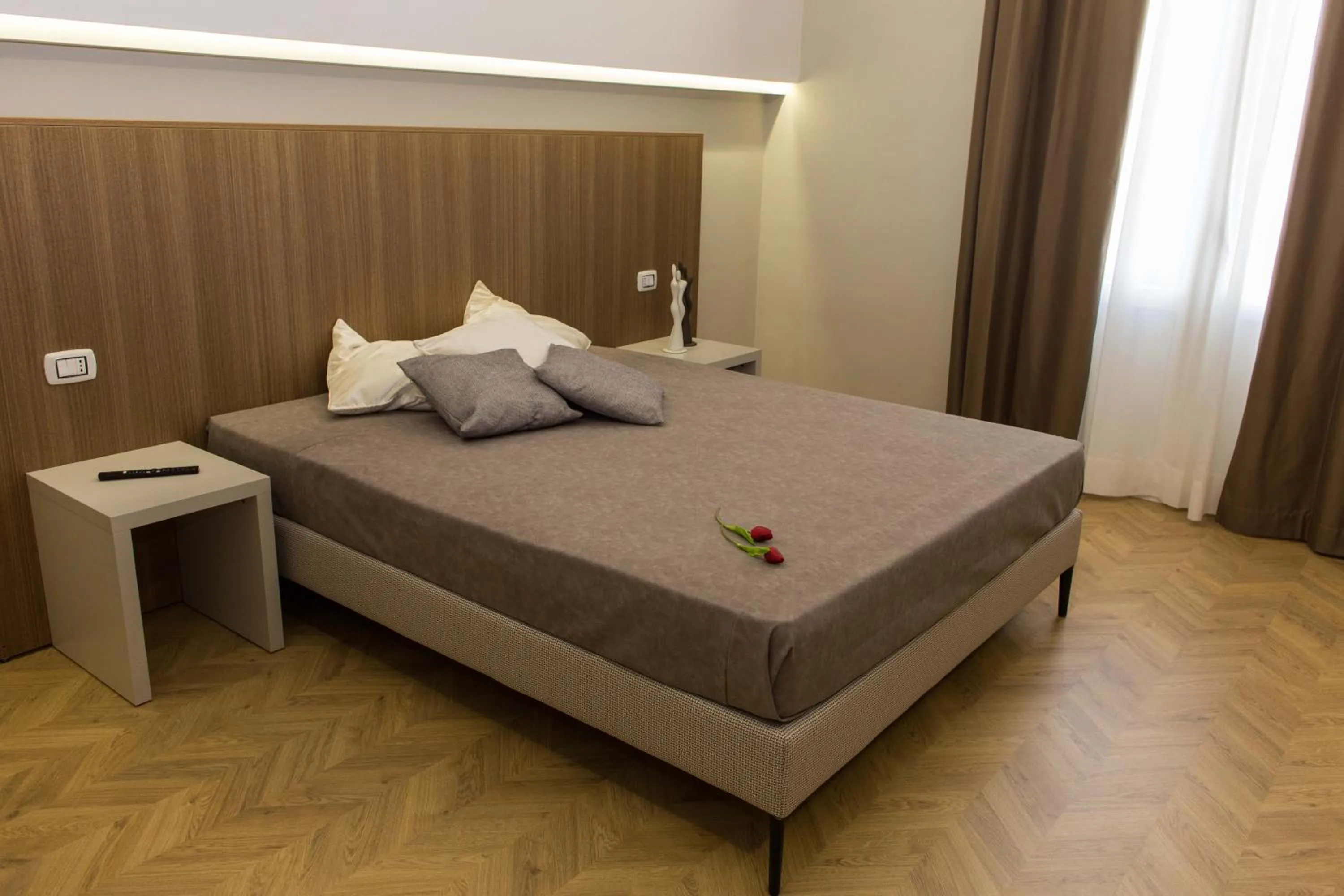 Bed in Le Affacciate Bruzie Home Guest House