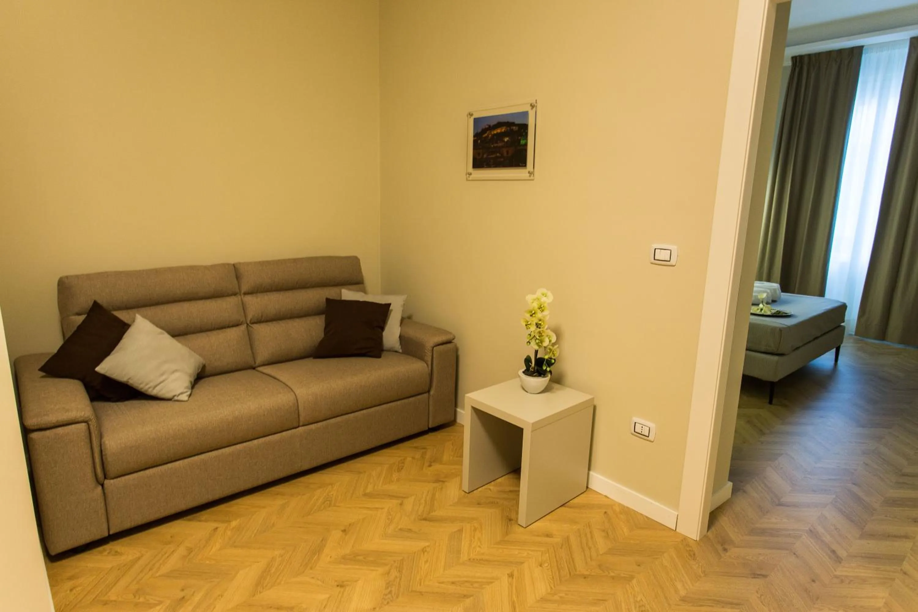 Seating area, Bed in Le Affacciate Bruzie Home Guest House