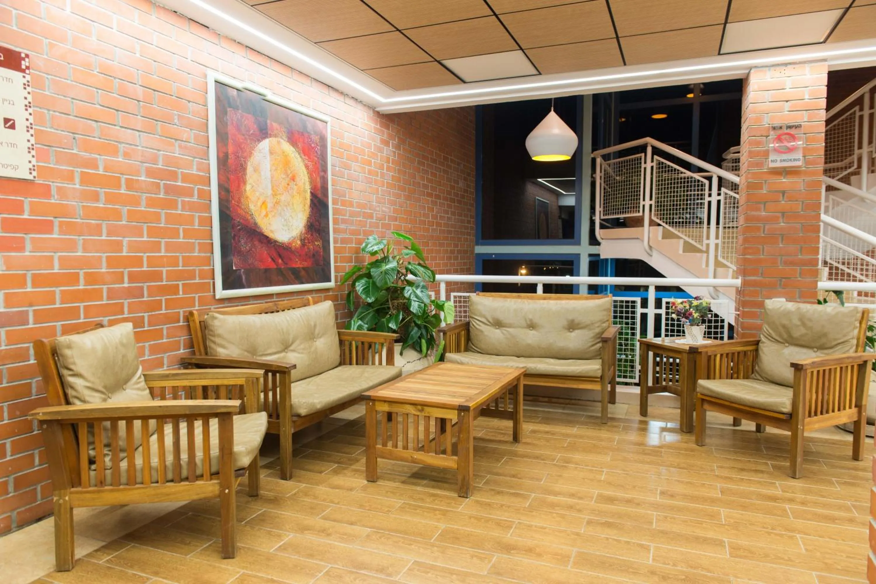 Lobby or reception in HI - Shlomi Hostel