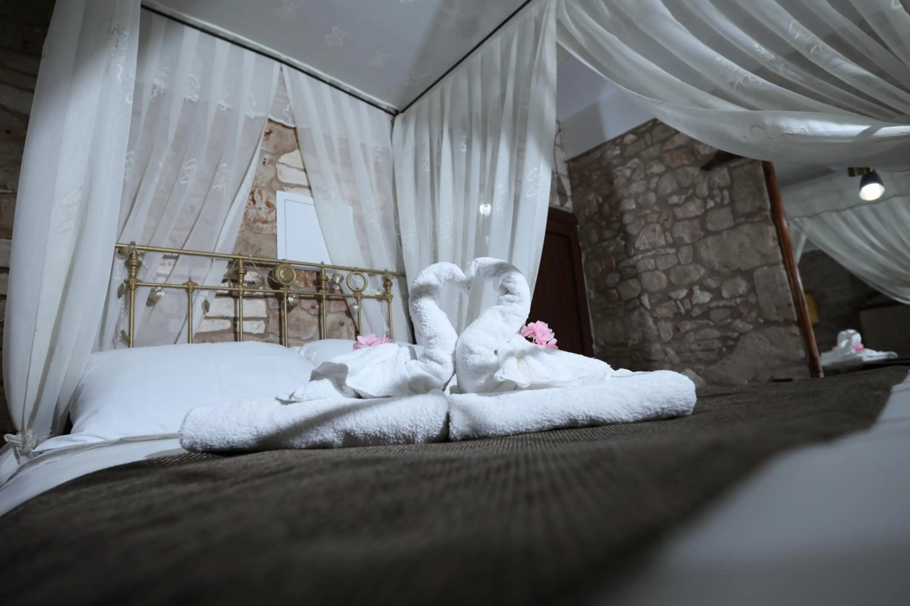 Bed in Hanna Koumi Boutique Hotel