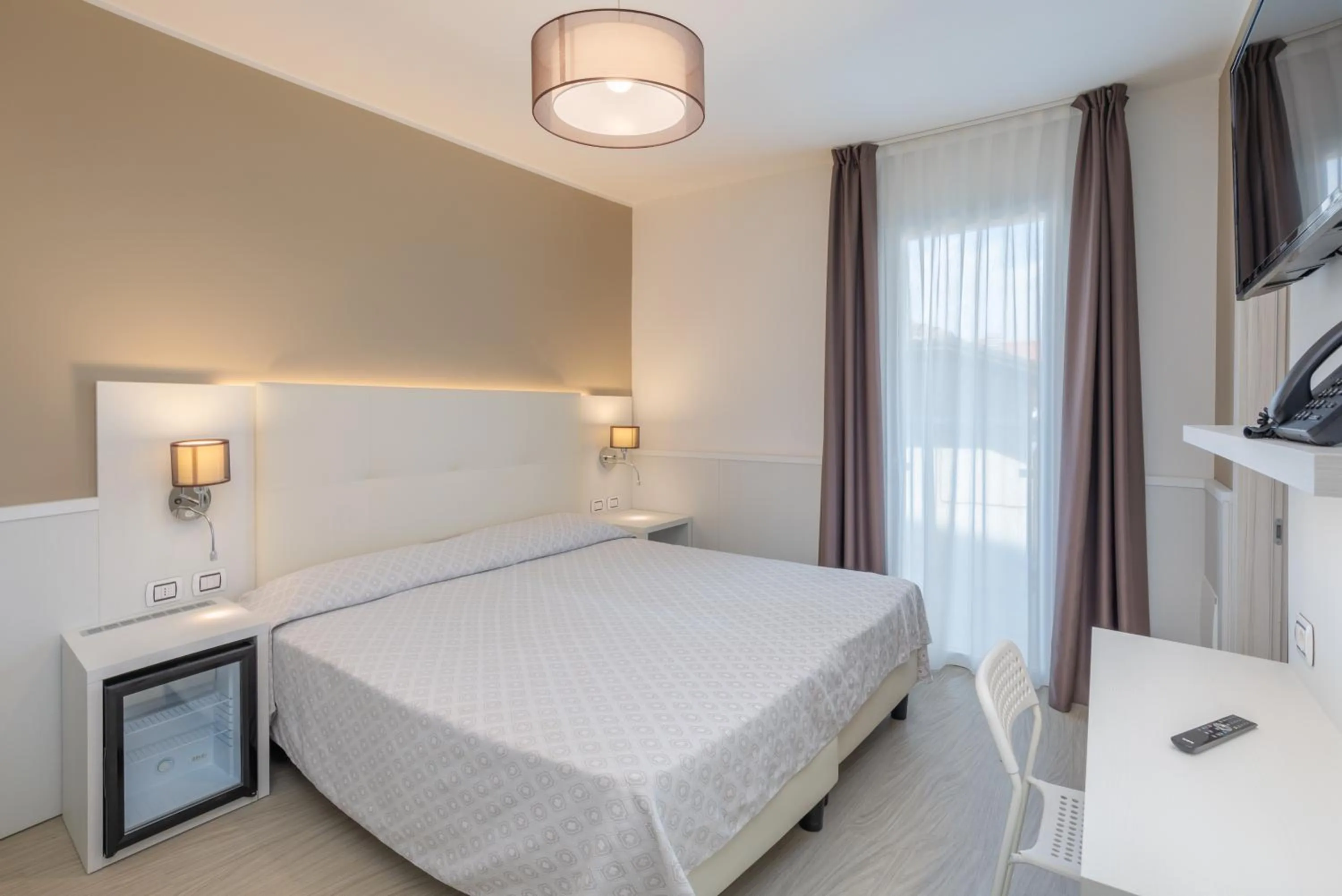 Bed in Hotel Garni' Serena