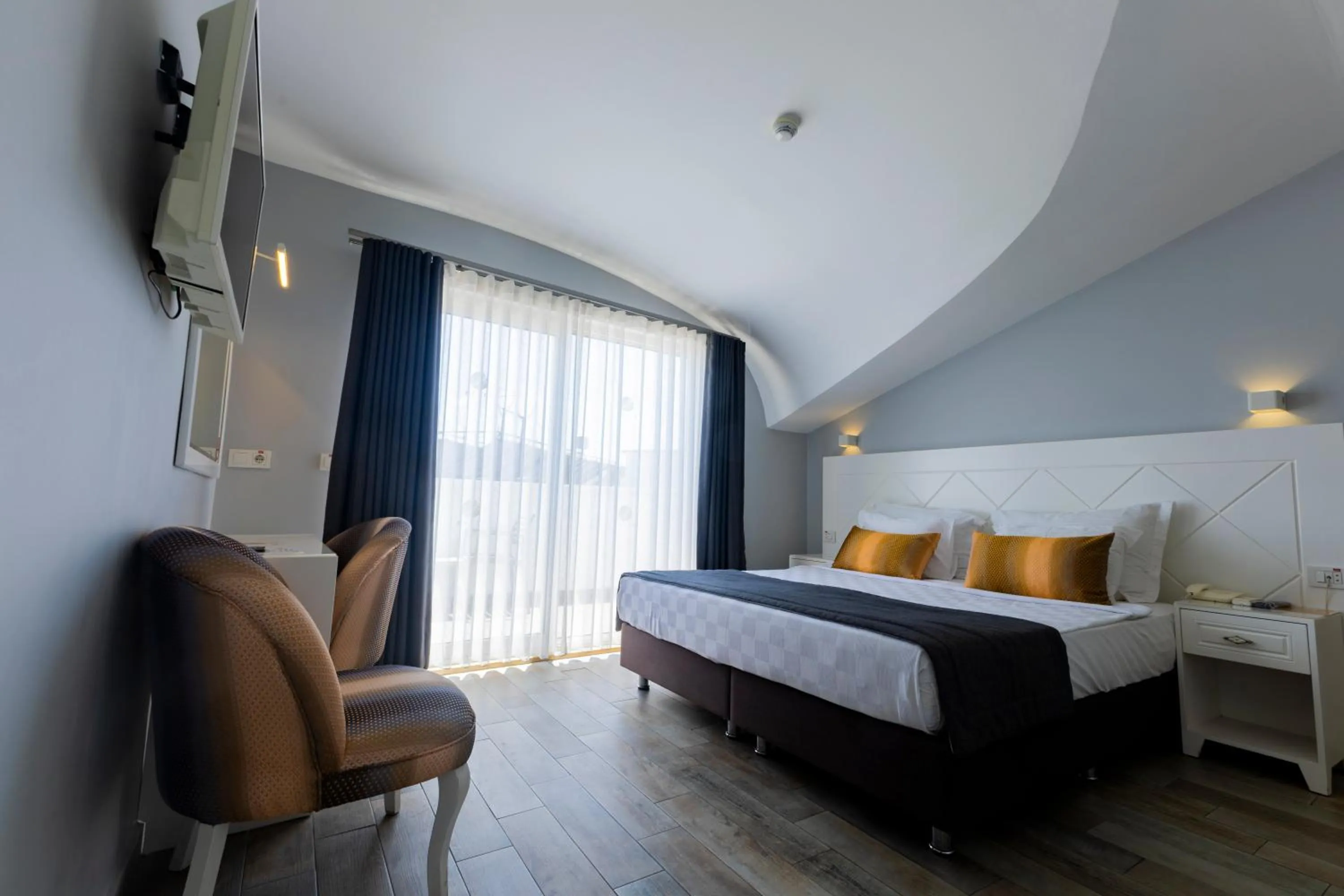 Bed in Motto Premium Hotel&Spa