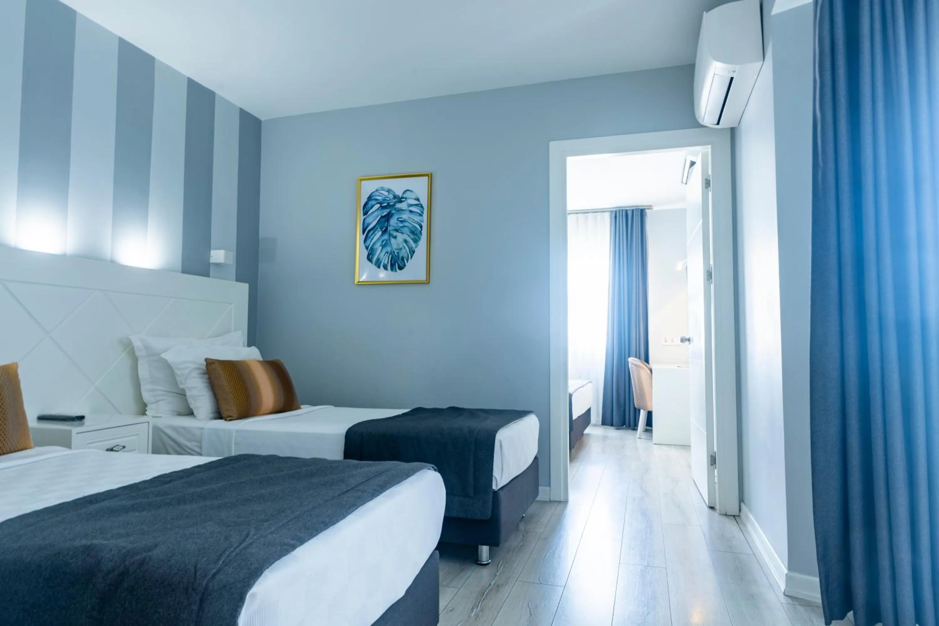 Bed in Motto Premium Hotel&Spa