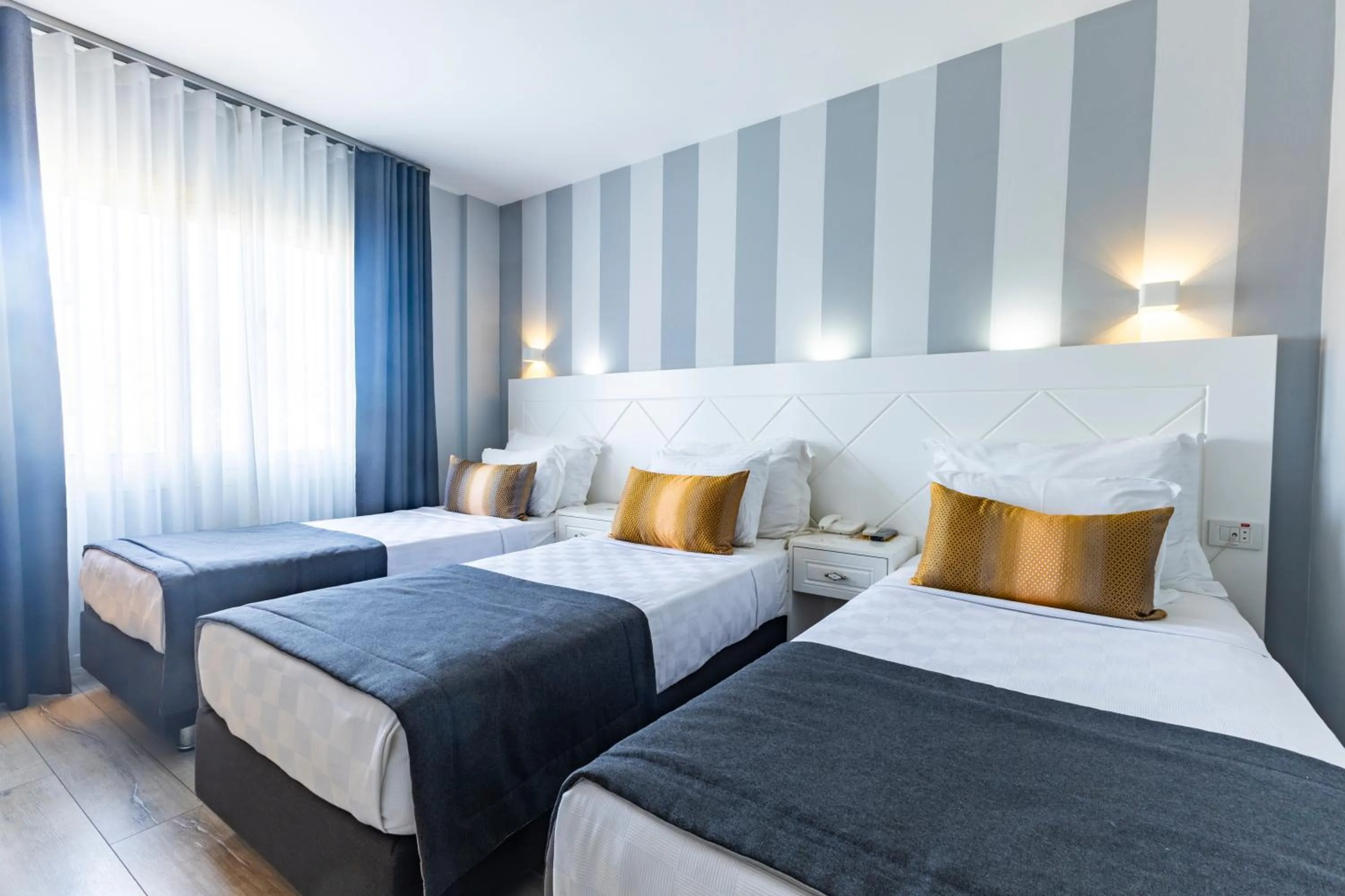 Bed in Motto Premium Hotel&Spa