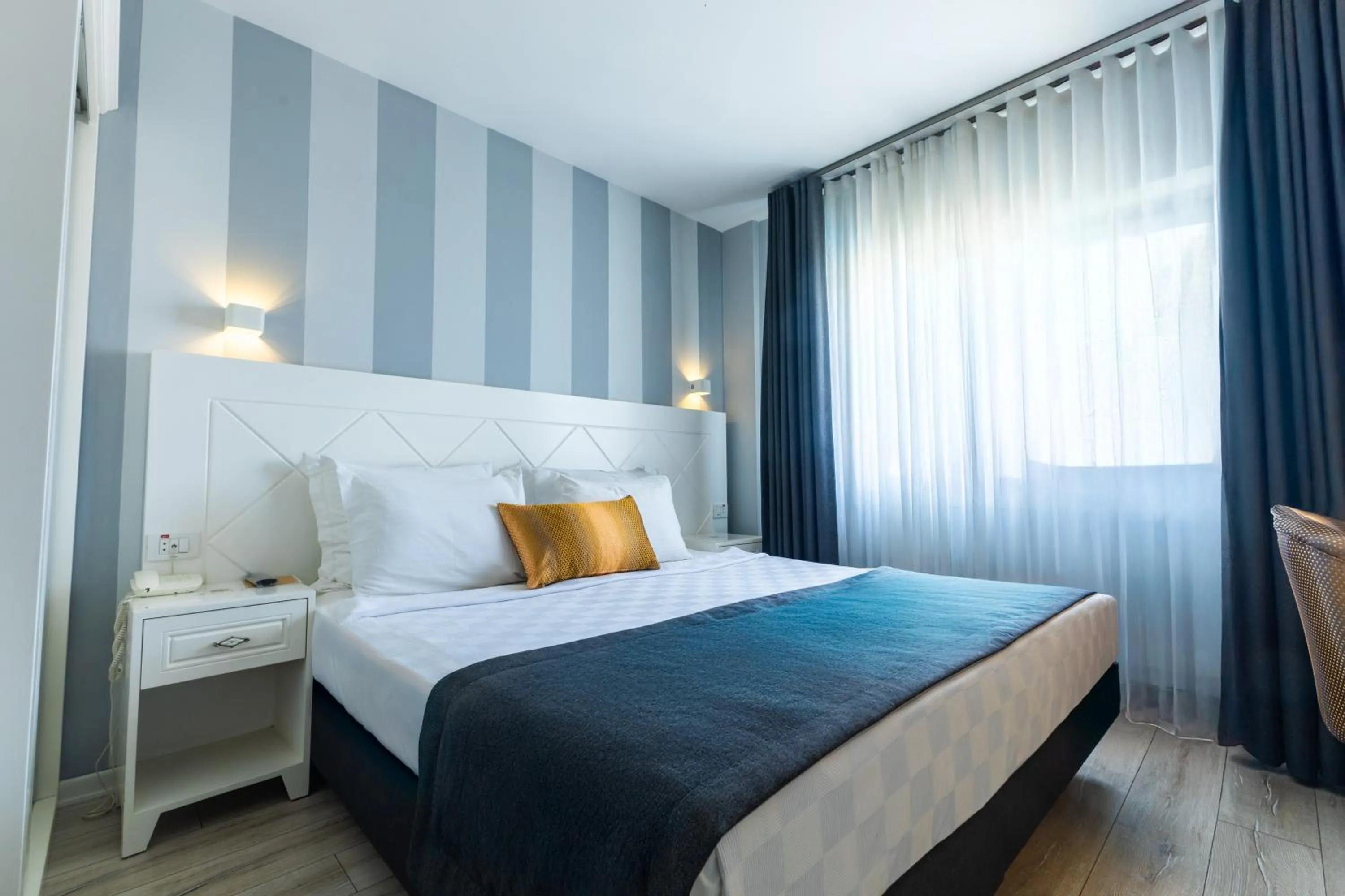 Bed in Motto Premium Hotel&Spa