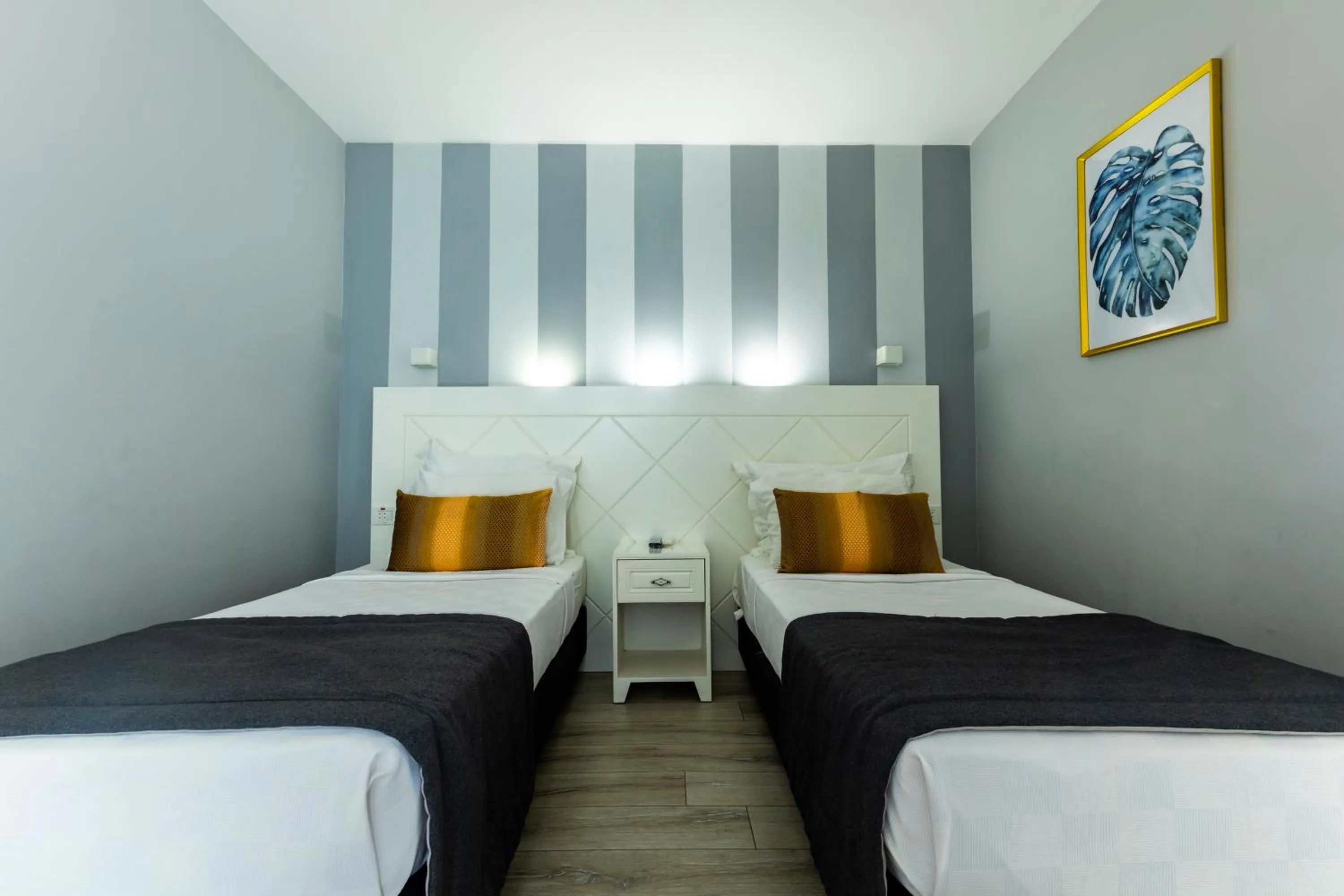 Bed in Motto Premium Hotel&Spa