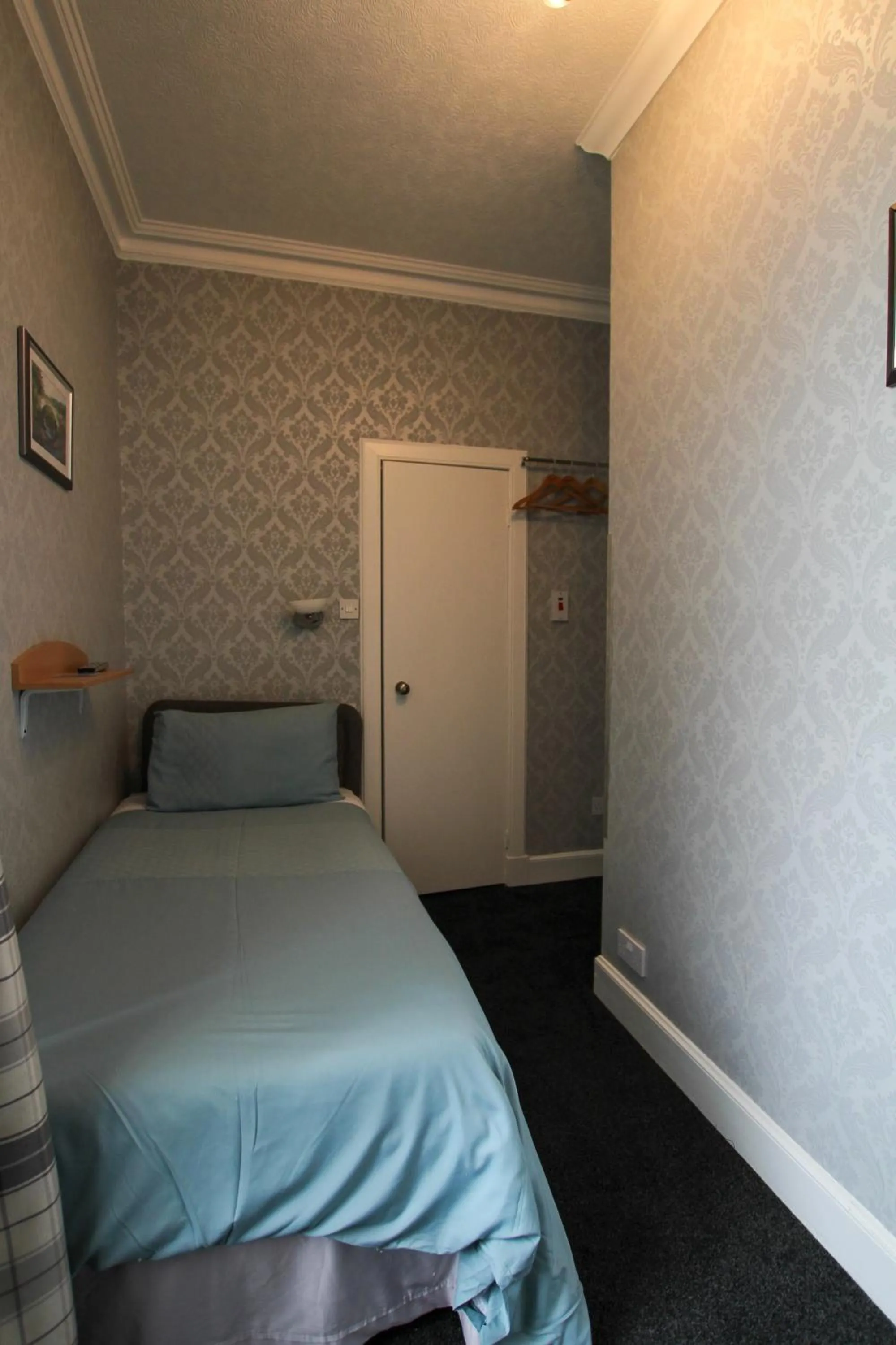 Bed in Dunallan Guest House