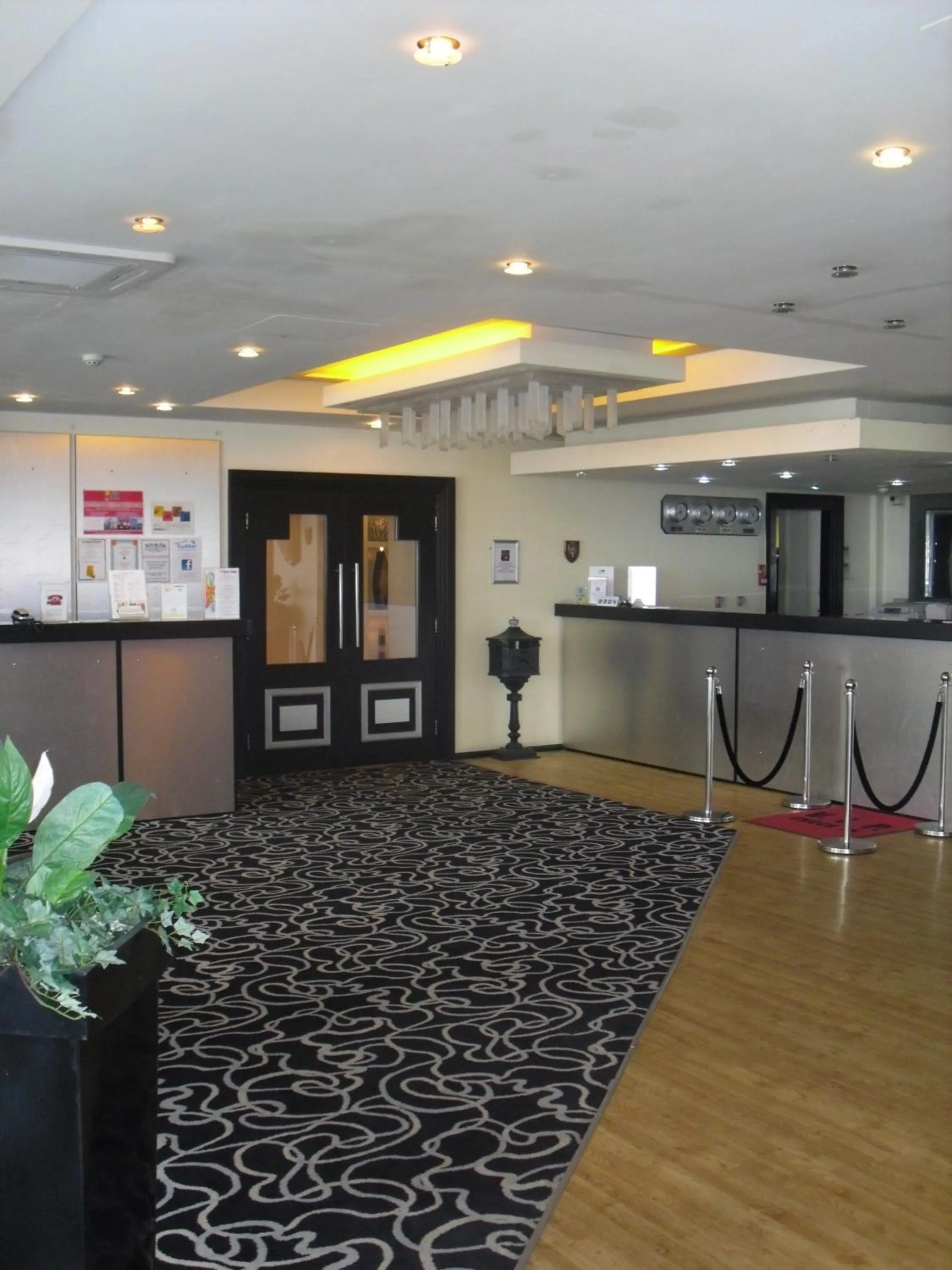 Lobby or reception in Tiffany's Hotel