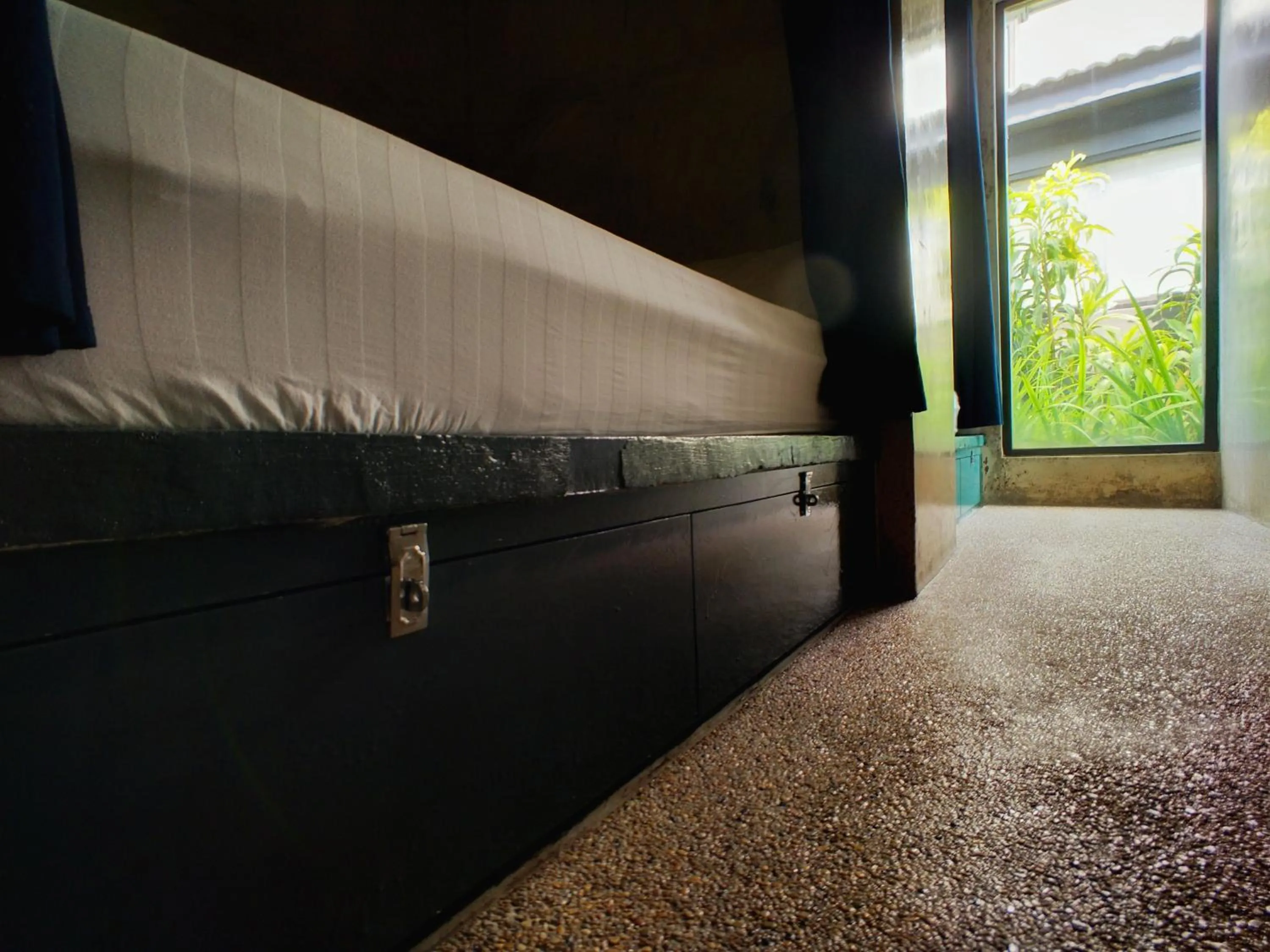 storage in Beds In Garden Hostel