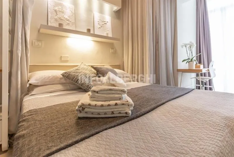 Bed in Albergo Aquila