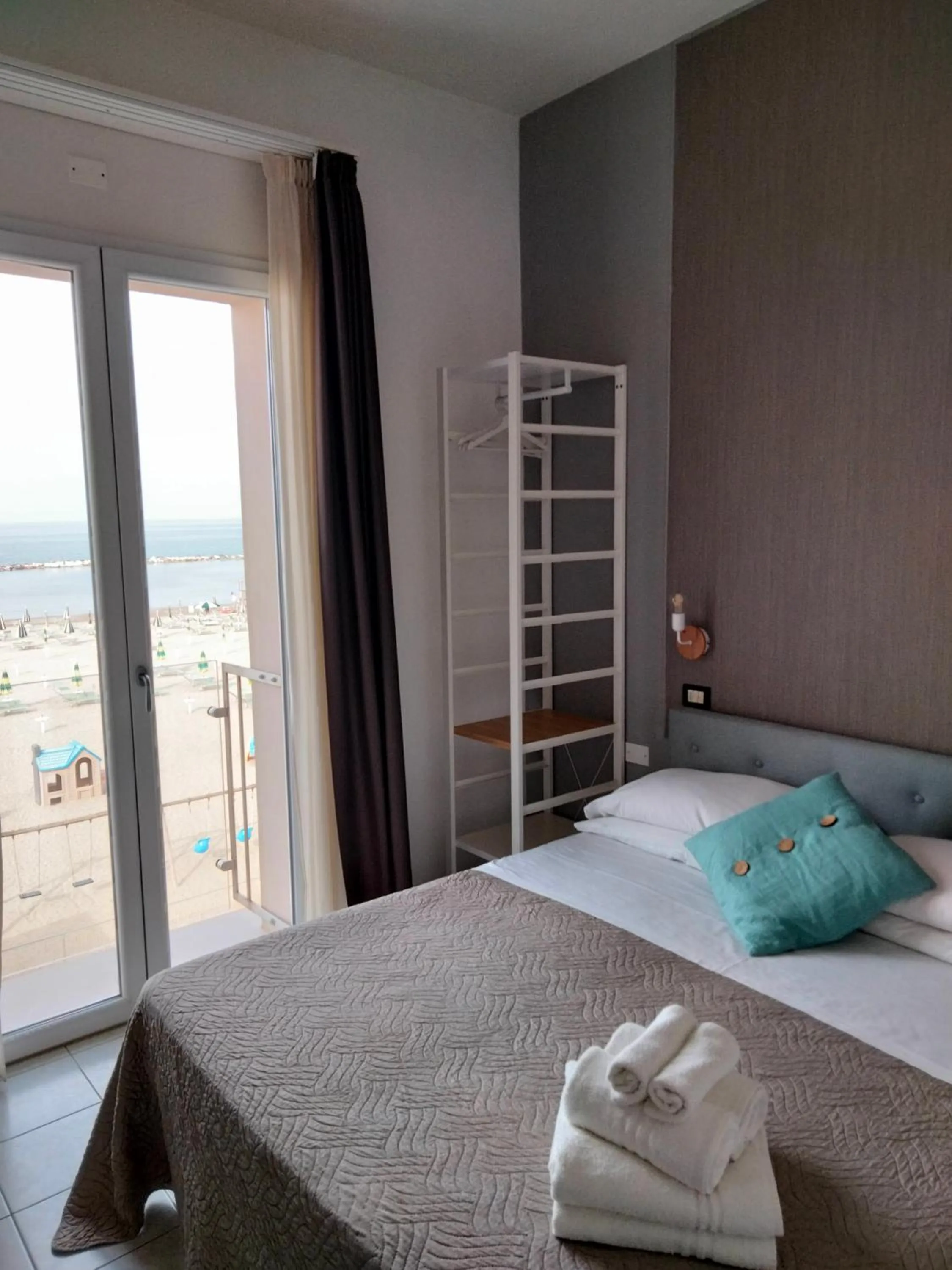 Bed in Albergo Aquila