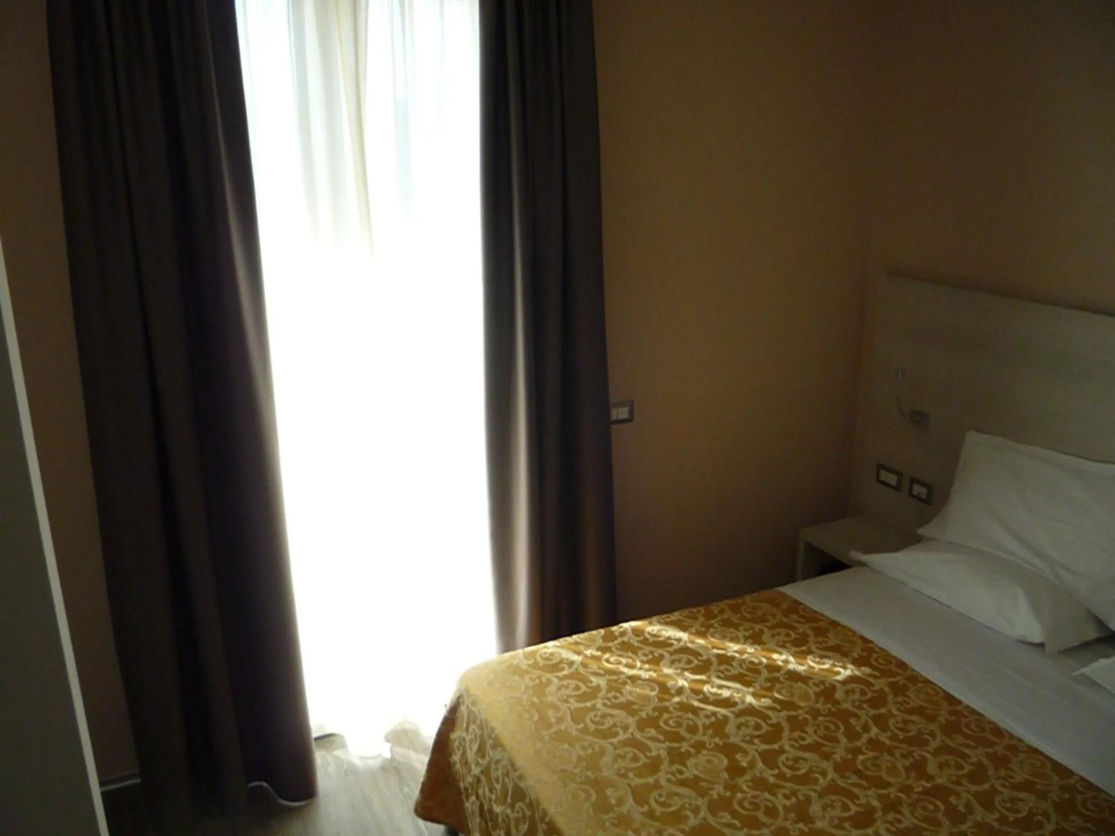 Photo of the whole room, Bed in Albergo Aquila