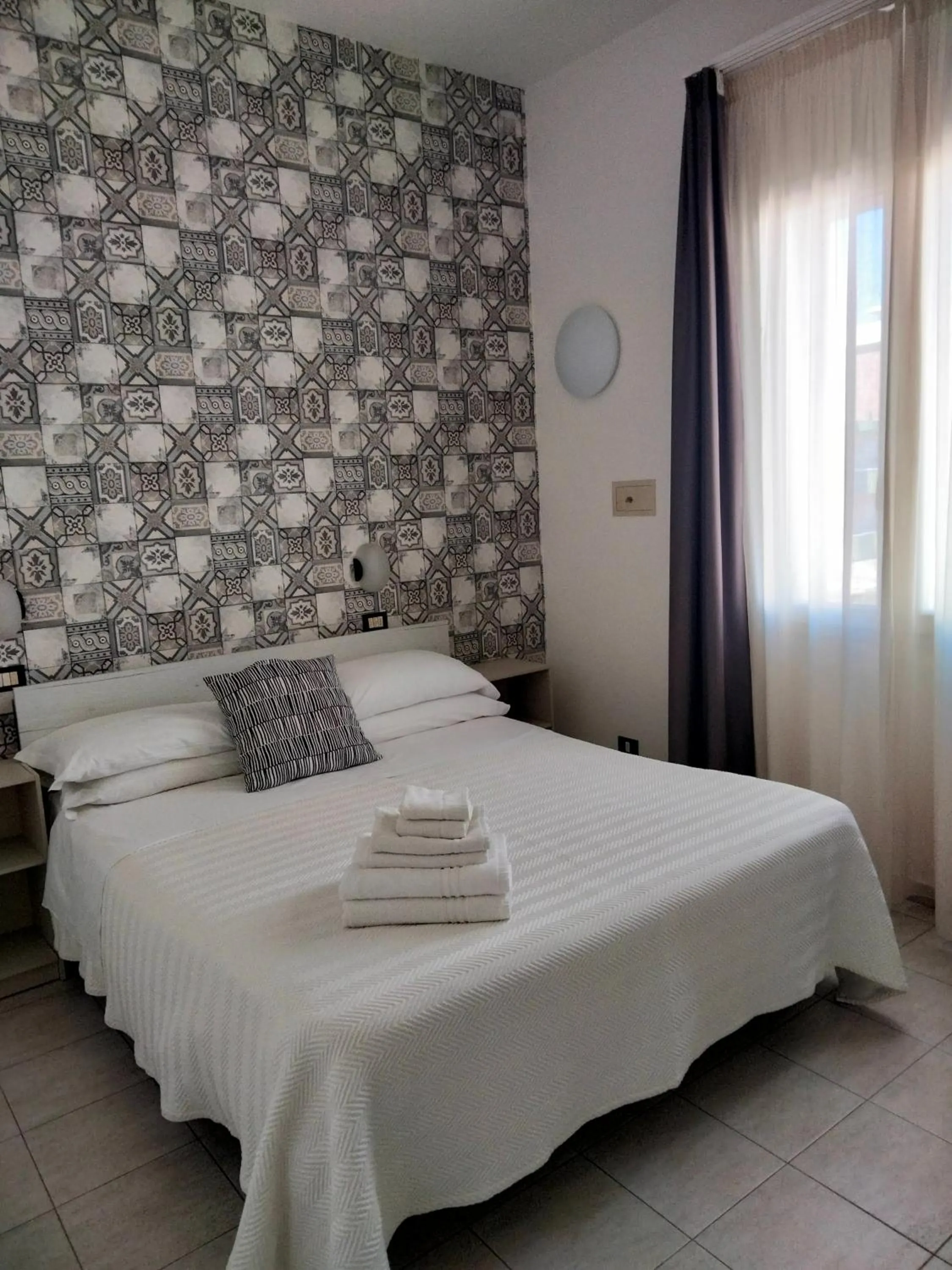 Bed in Albergo Aquila