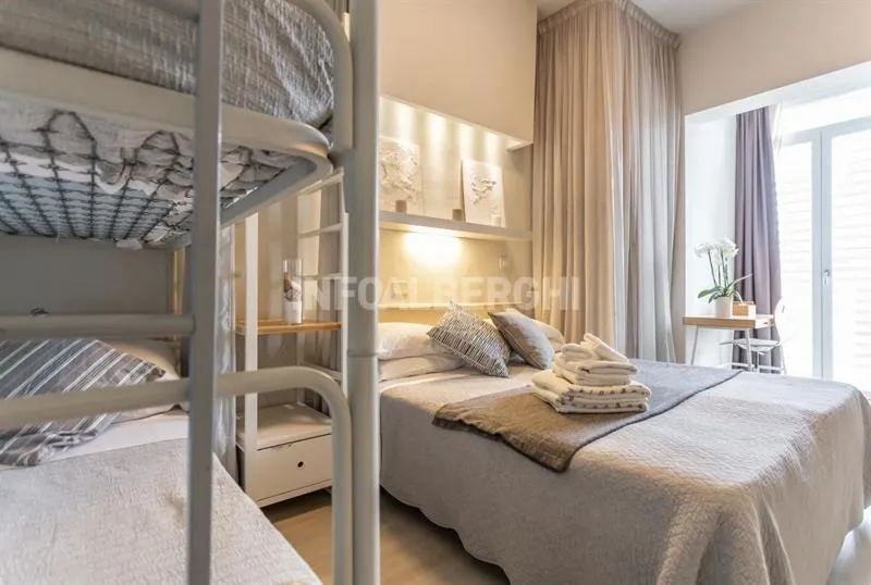 Bed in Albergo Aquila