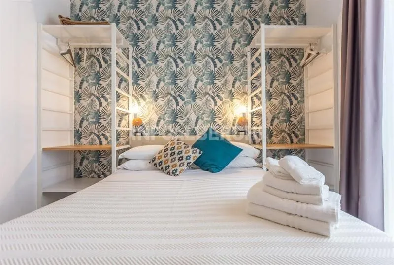 Bed in Albergo Aquila