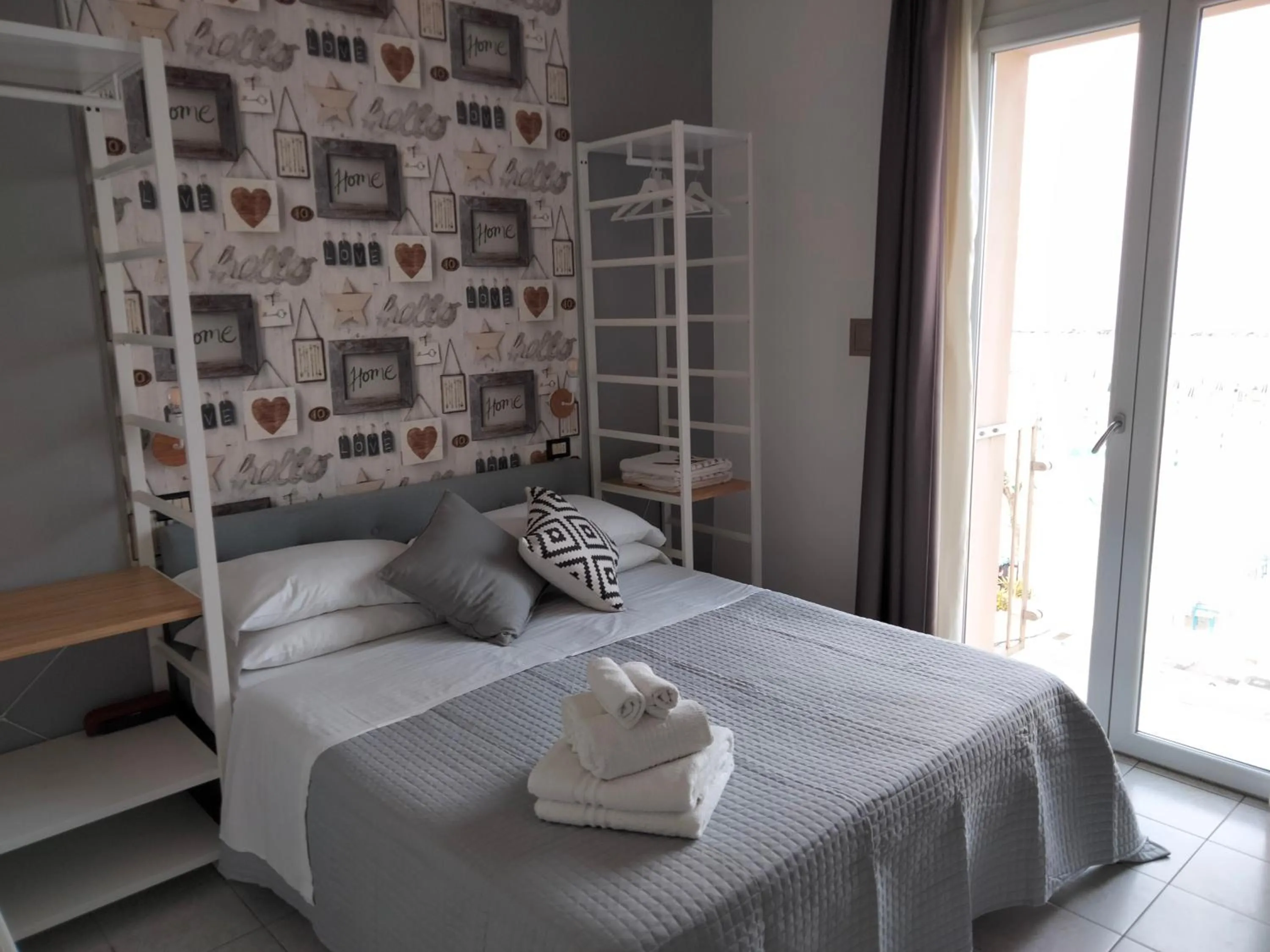 Bed in Albergo Aquila