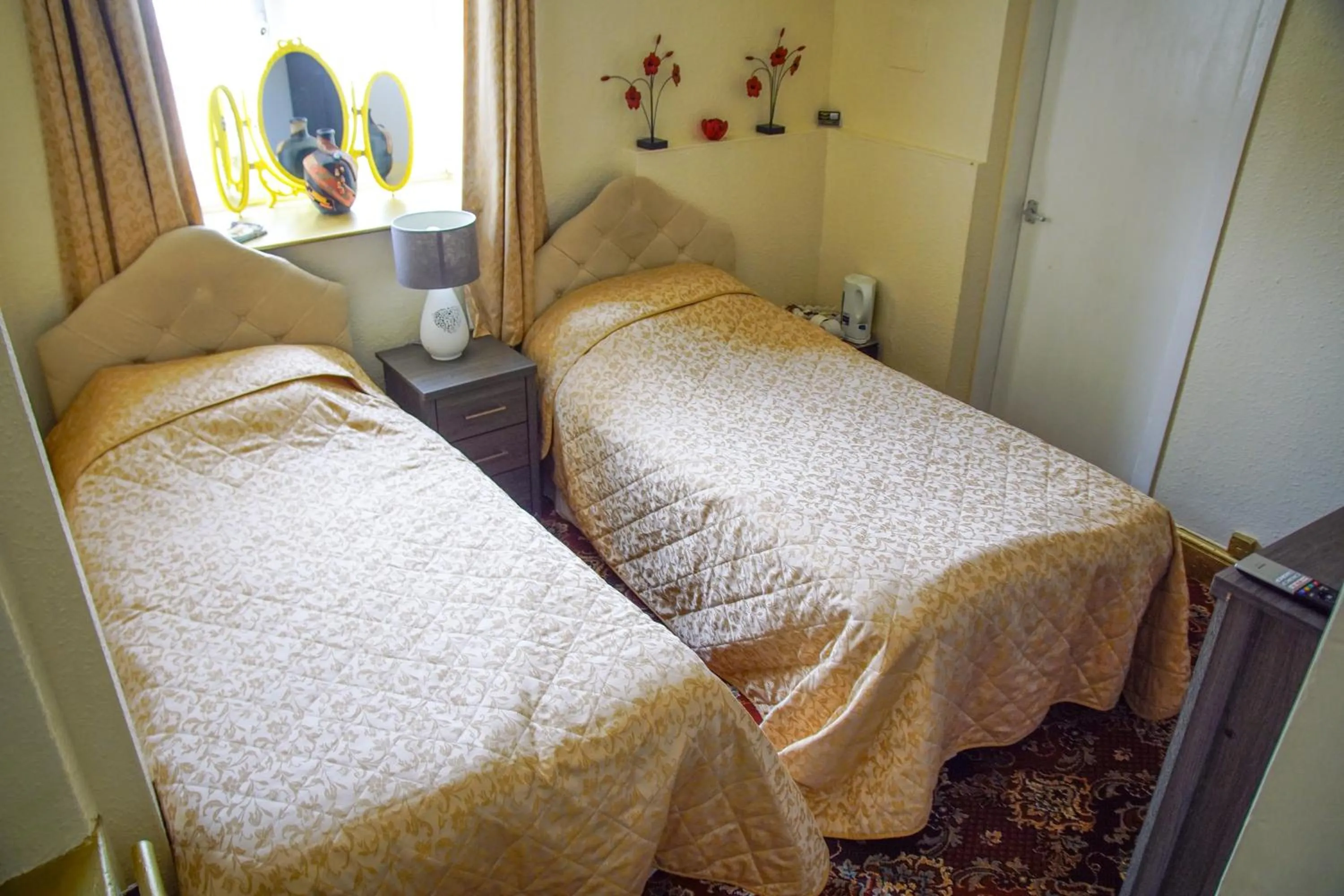 Bed in Abbey Grange Hotel