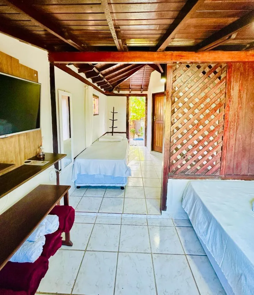 Bed in Pousada Tropicália