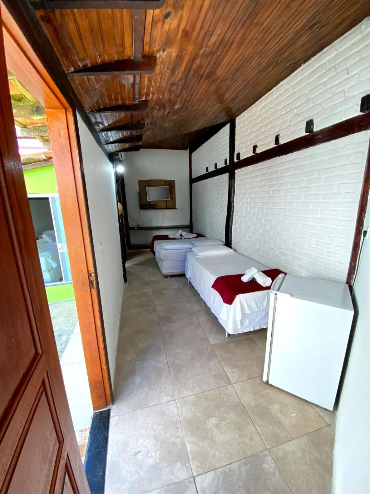 Bed in Pousada Tropicália