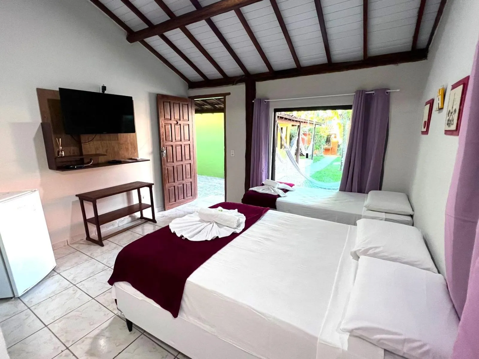 Bed in Pousada Tropicália