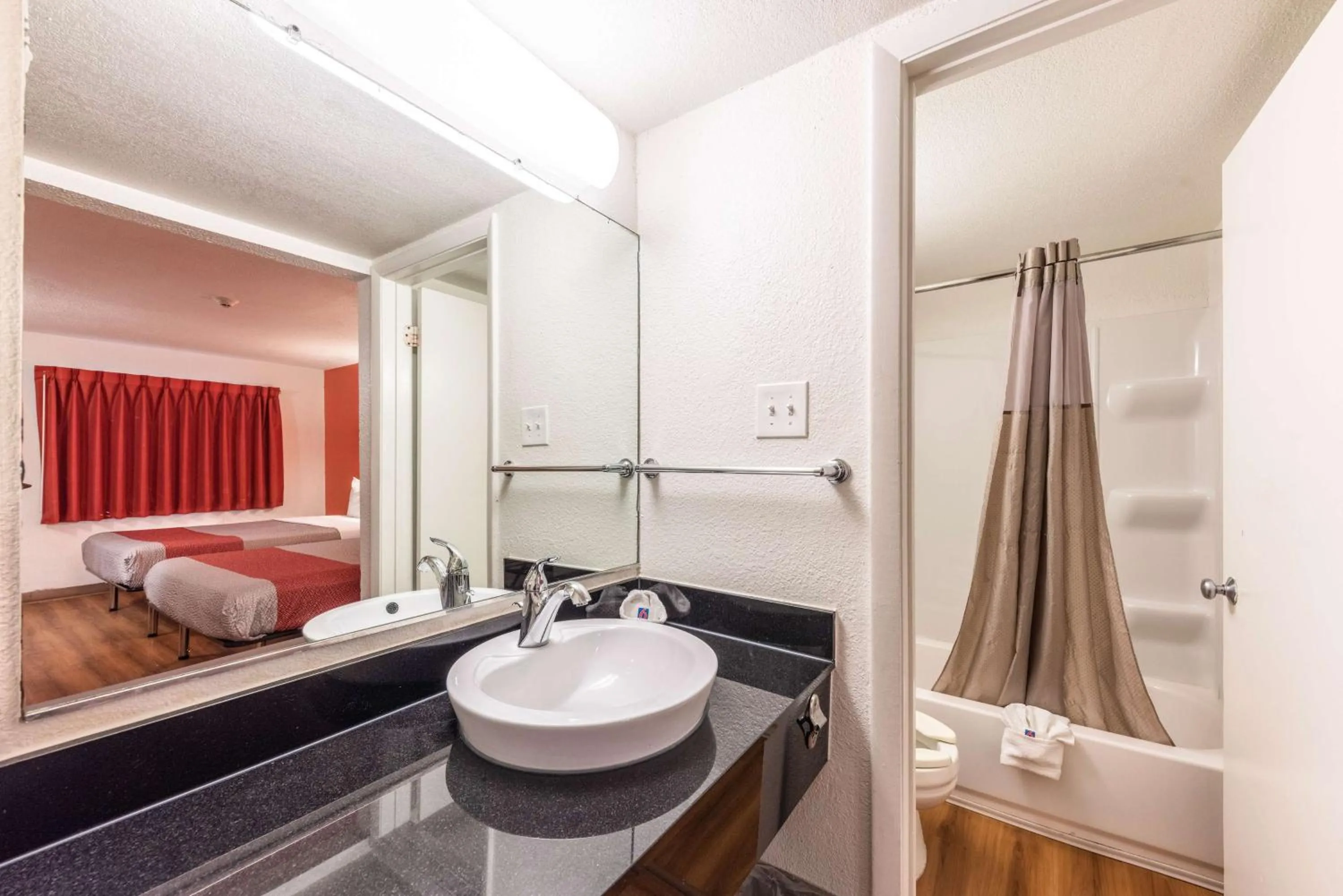 Toilet, Bed in Motel 6-North Richland Hills, TX