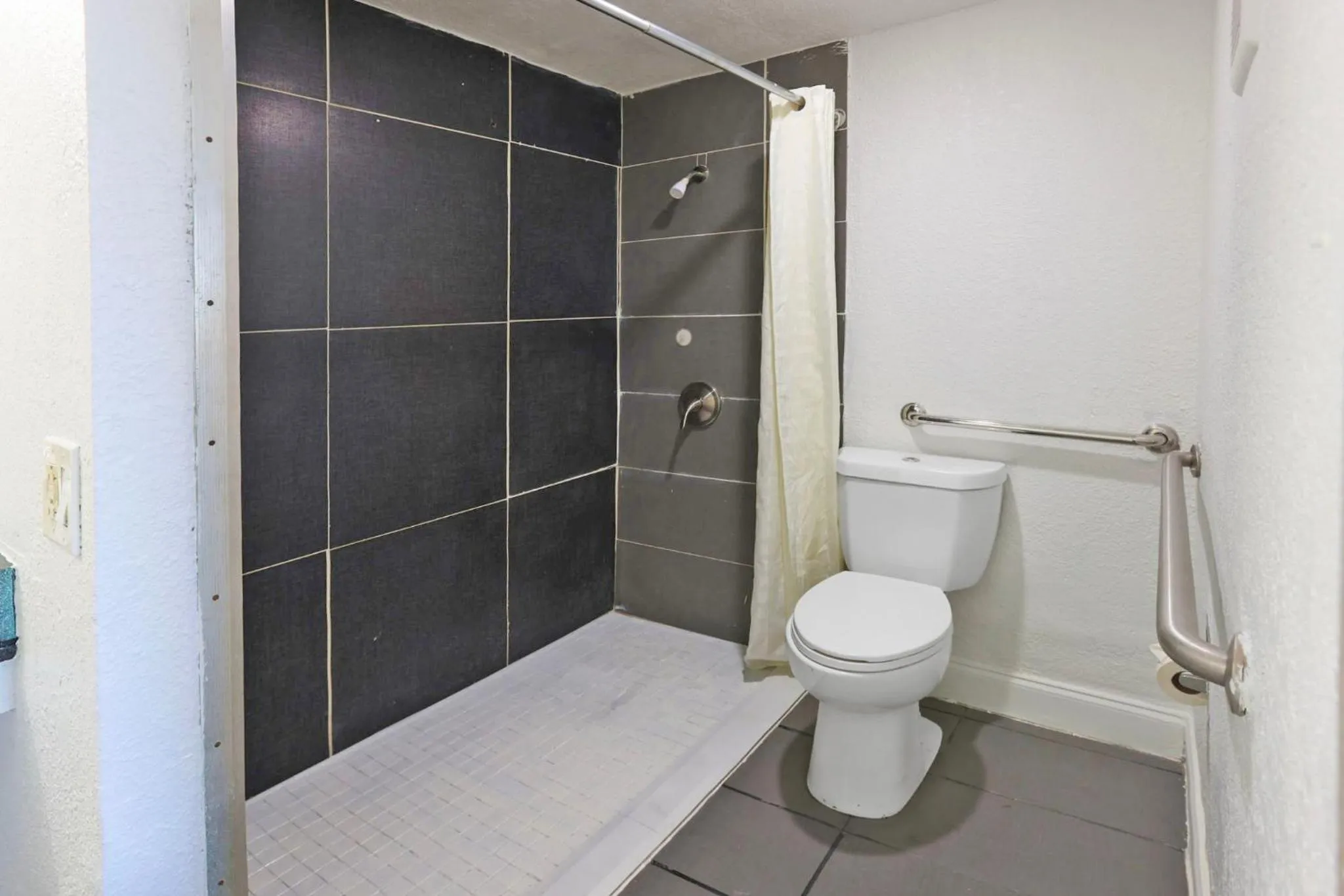 Bathroom in Super 7 Inn by Hotel O Dallas I 20