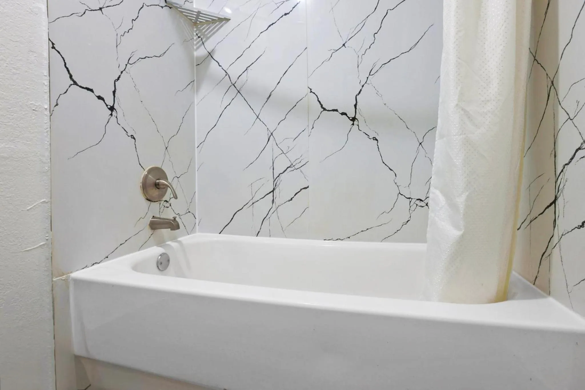 Bath in Super 7 Inn by Hotel O Dallas I 20