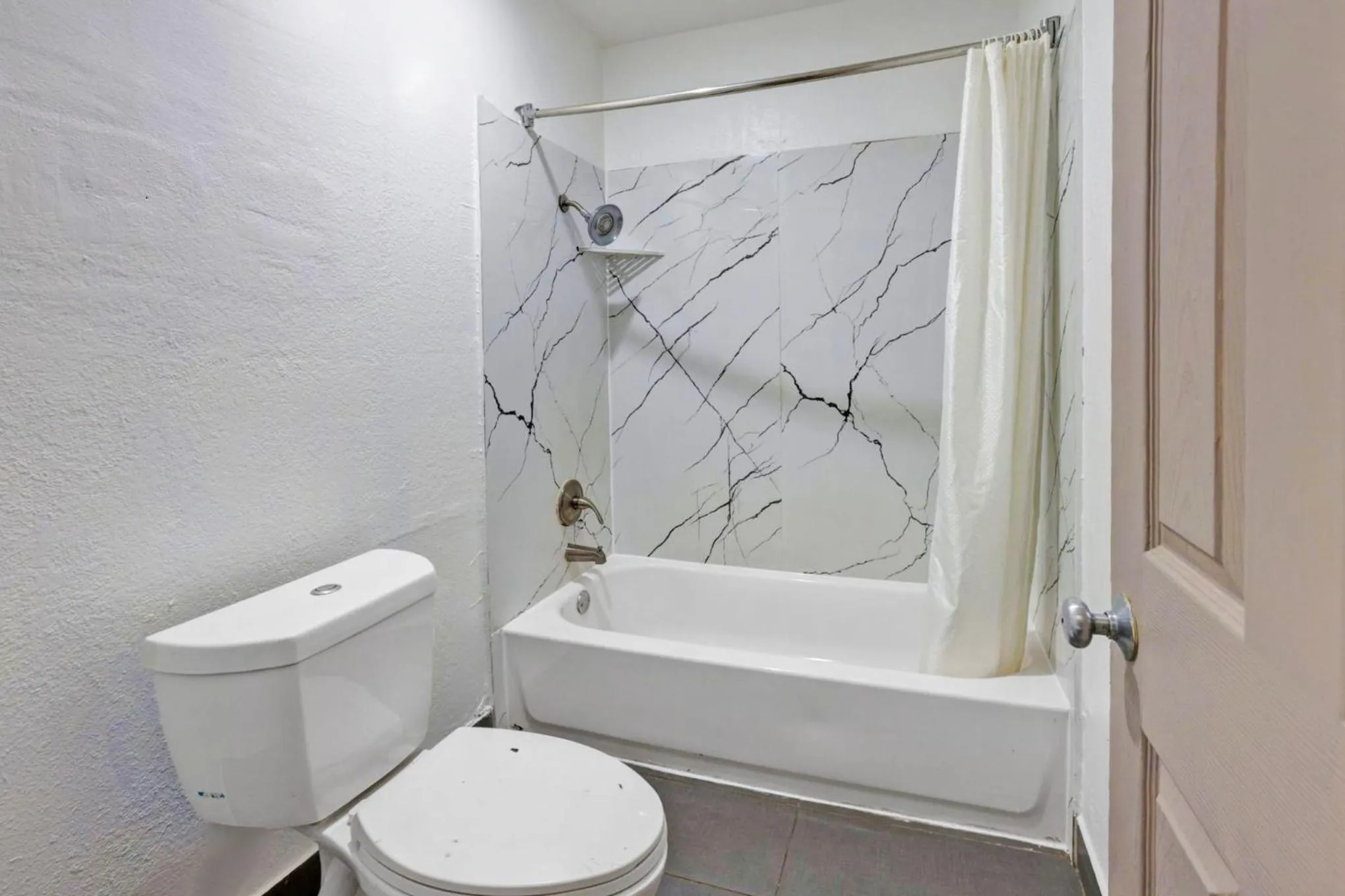 Bathroom in Super 7 Inn by Hotel O Dallas I 20