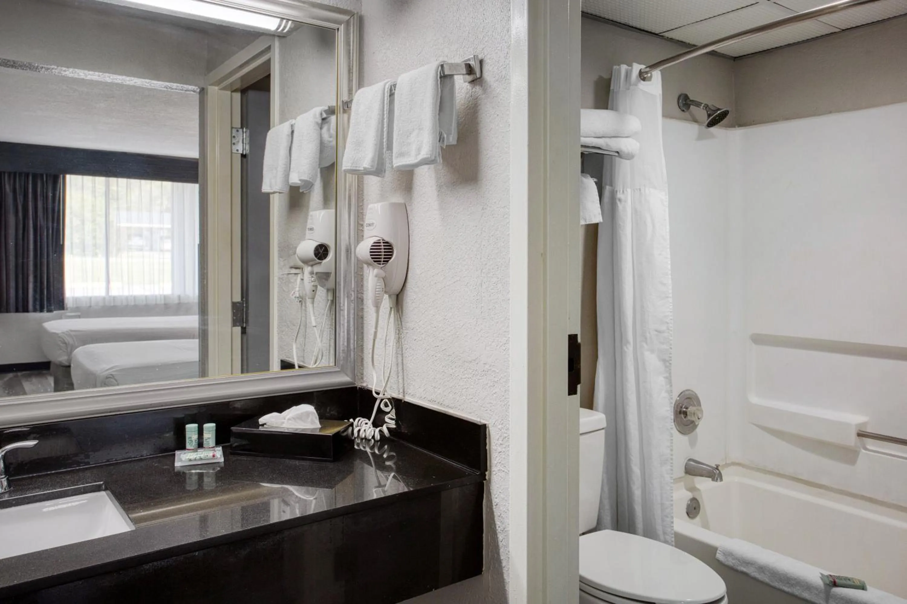 Shower in Best Western Executive Inn