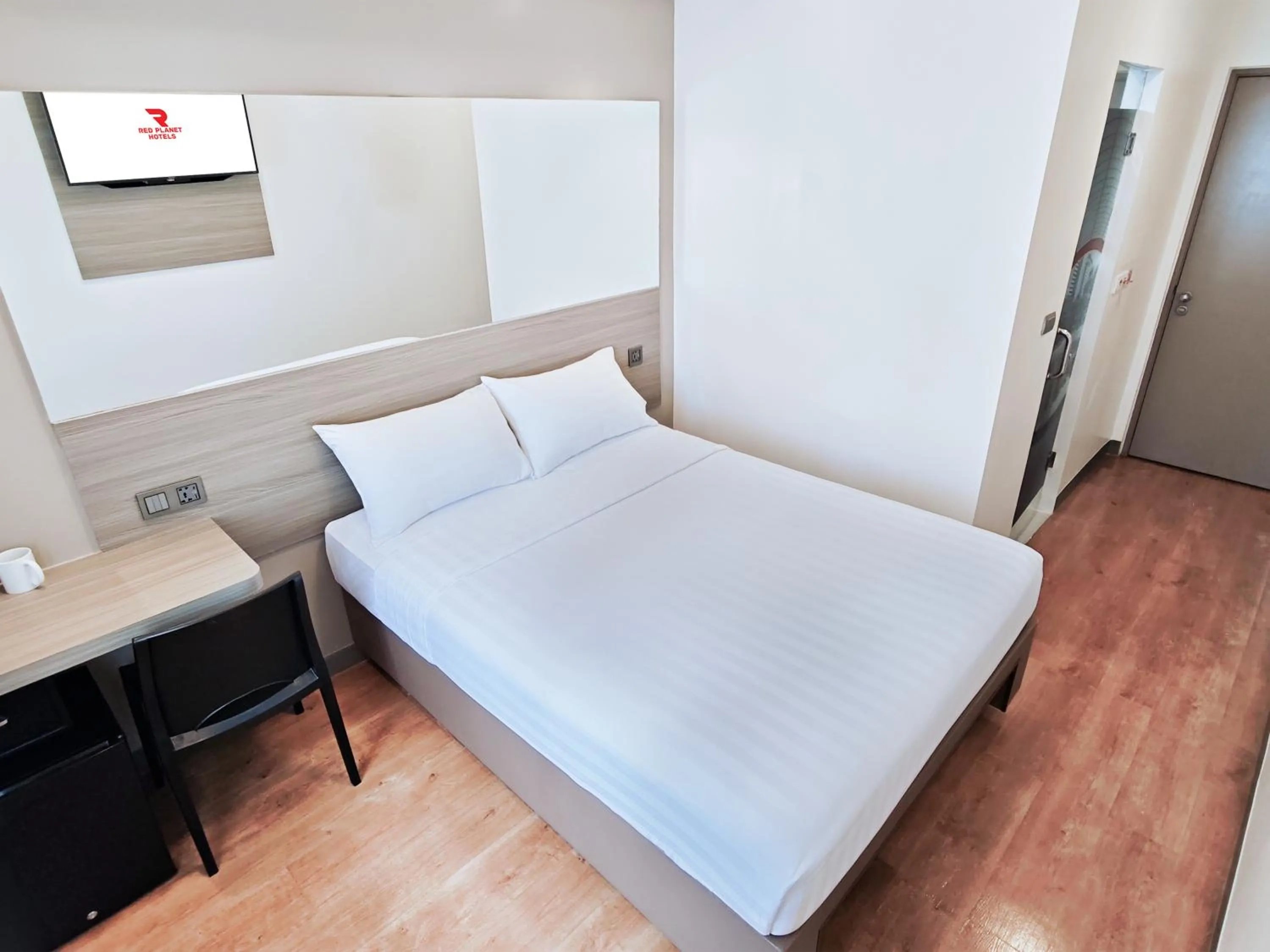 Bed in Red Planet Manila Malate Mabini