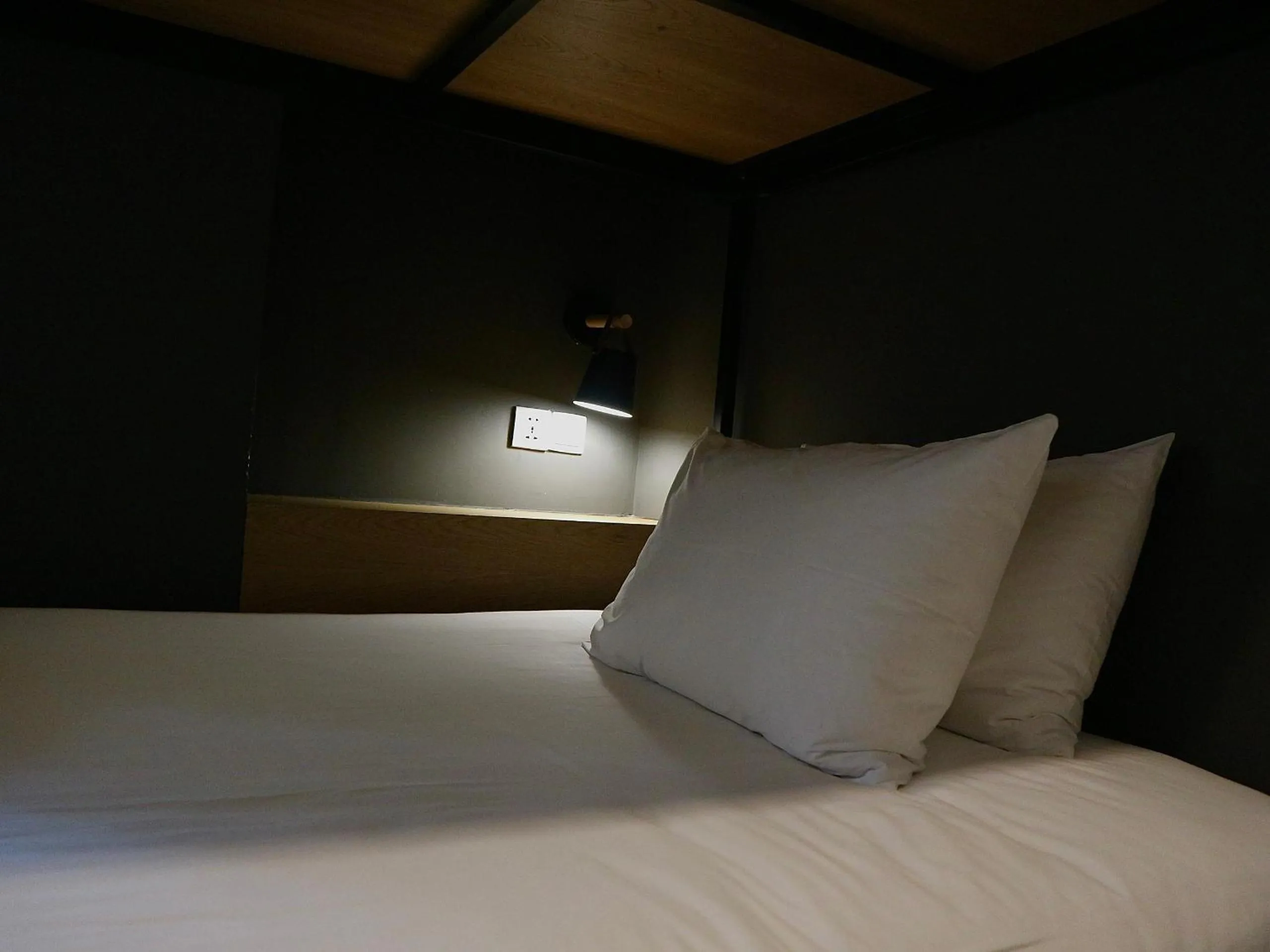 Bed in The Hammock Hotel Fine Arts Museum