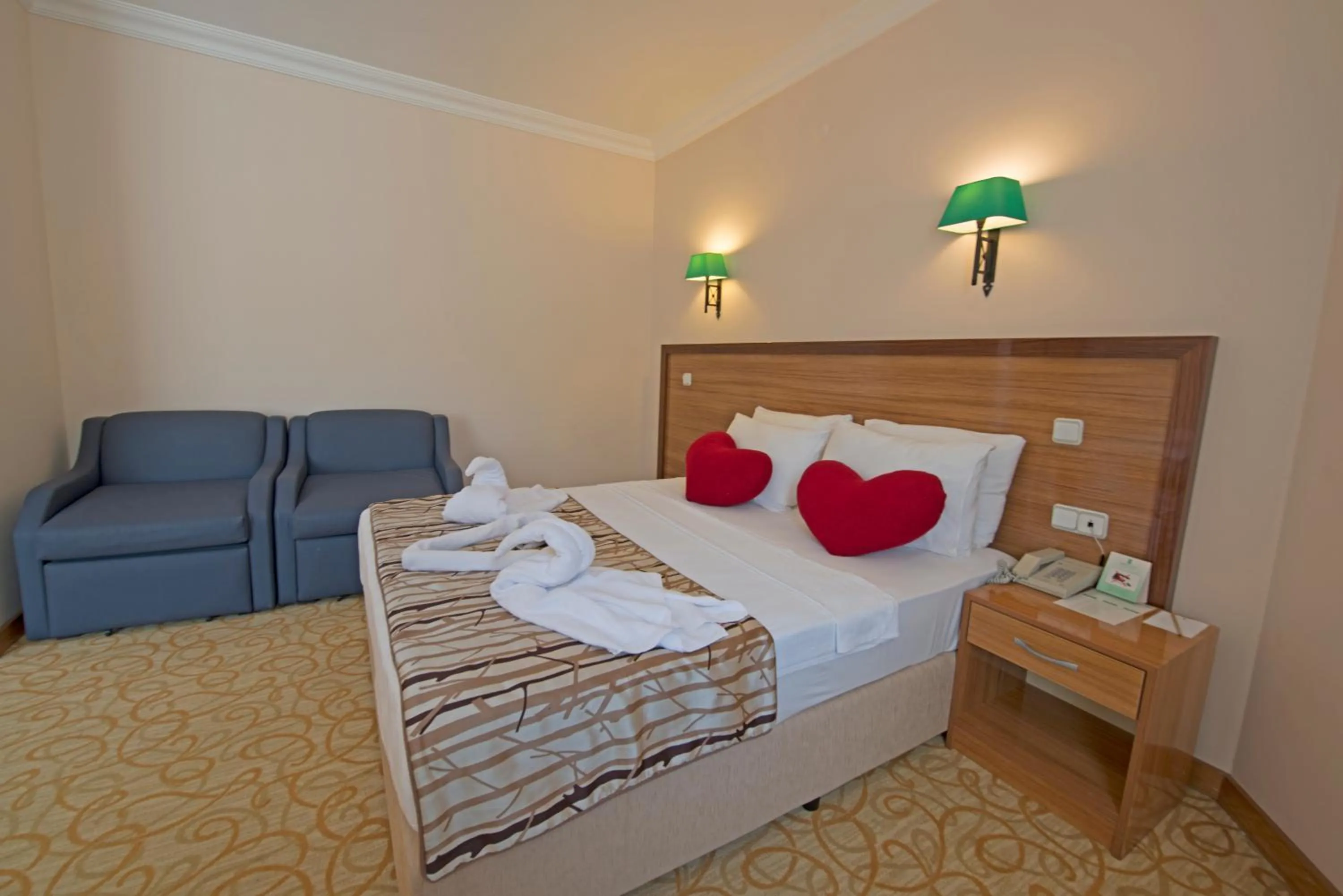 Bed in Green Nature Resort and Spa