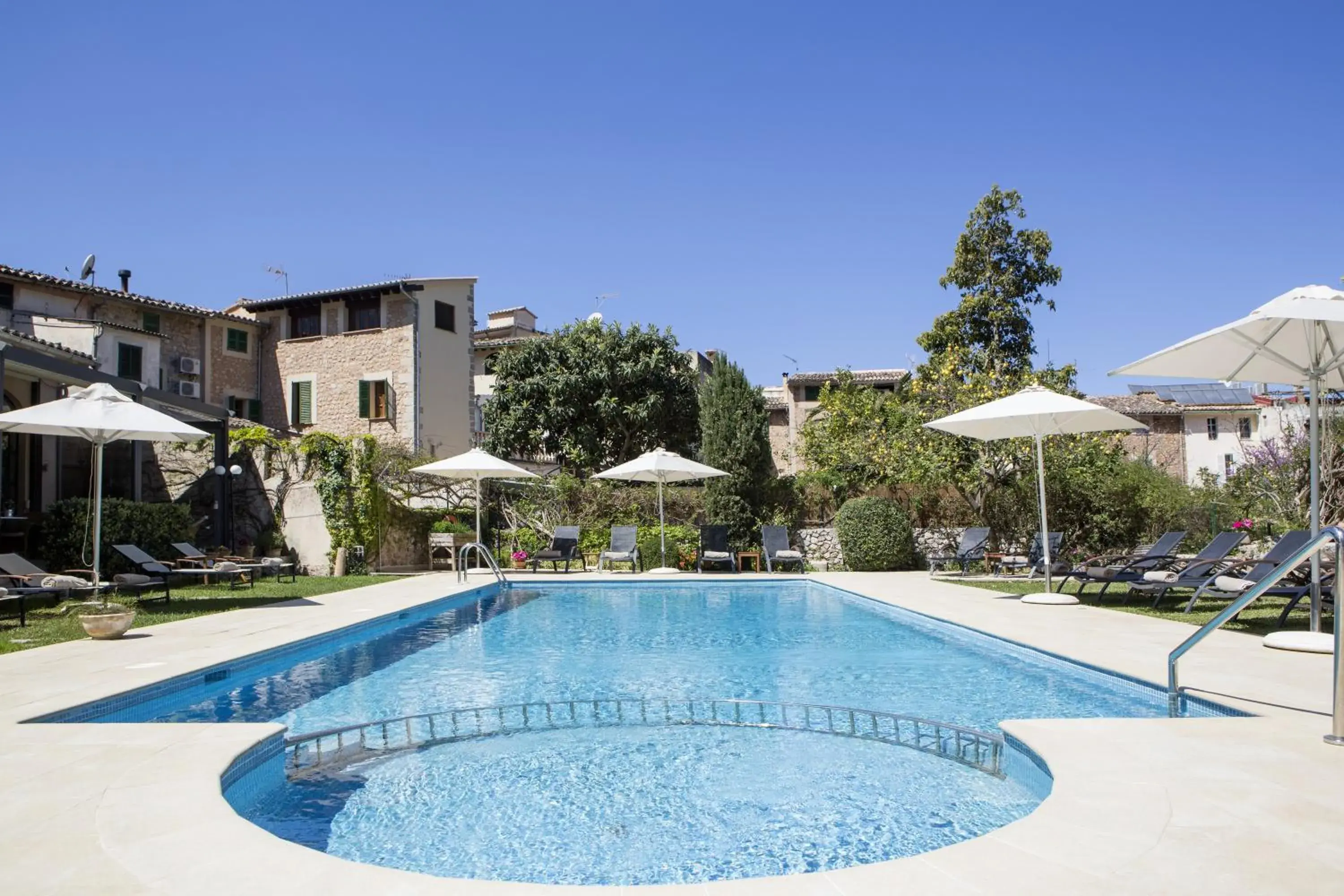 Suite with terrace - Ground Floor in Hotel Ca'l Bisbe Suite with terrace - Ground Floor in Hotel Ca'l Bisbe