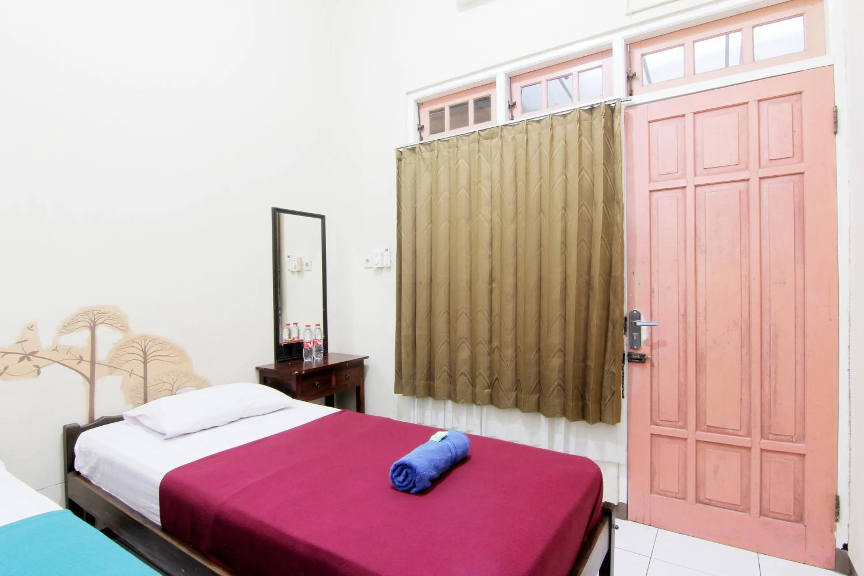 Bed in Monica Hotel Yogyakarta