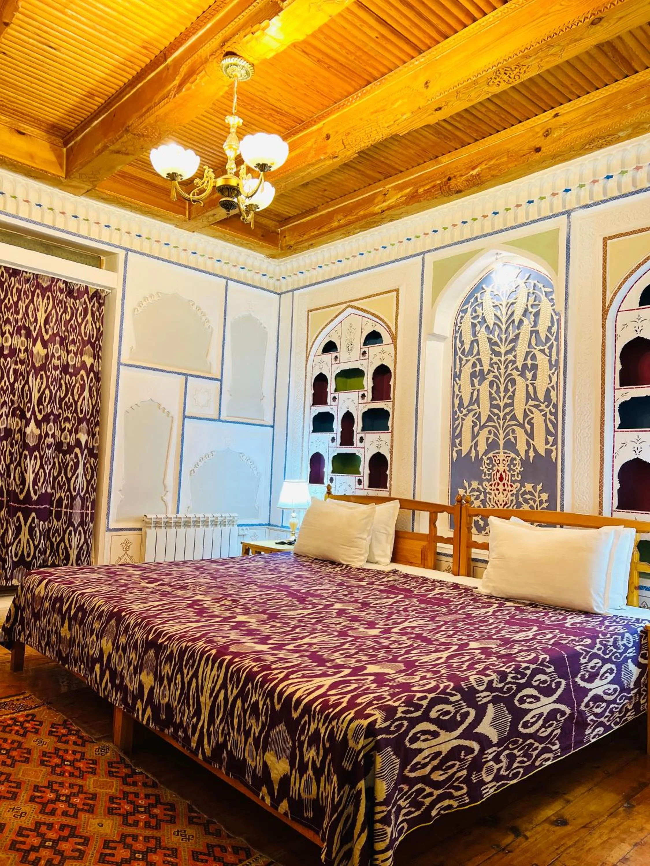 Bed in Komil Bukhara Boutique Hotel