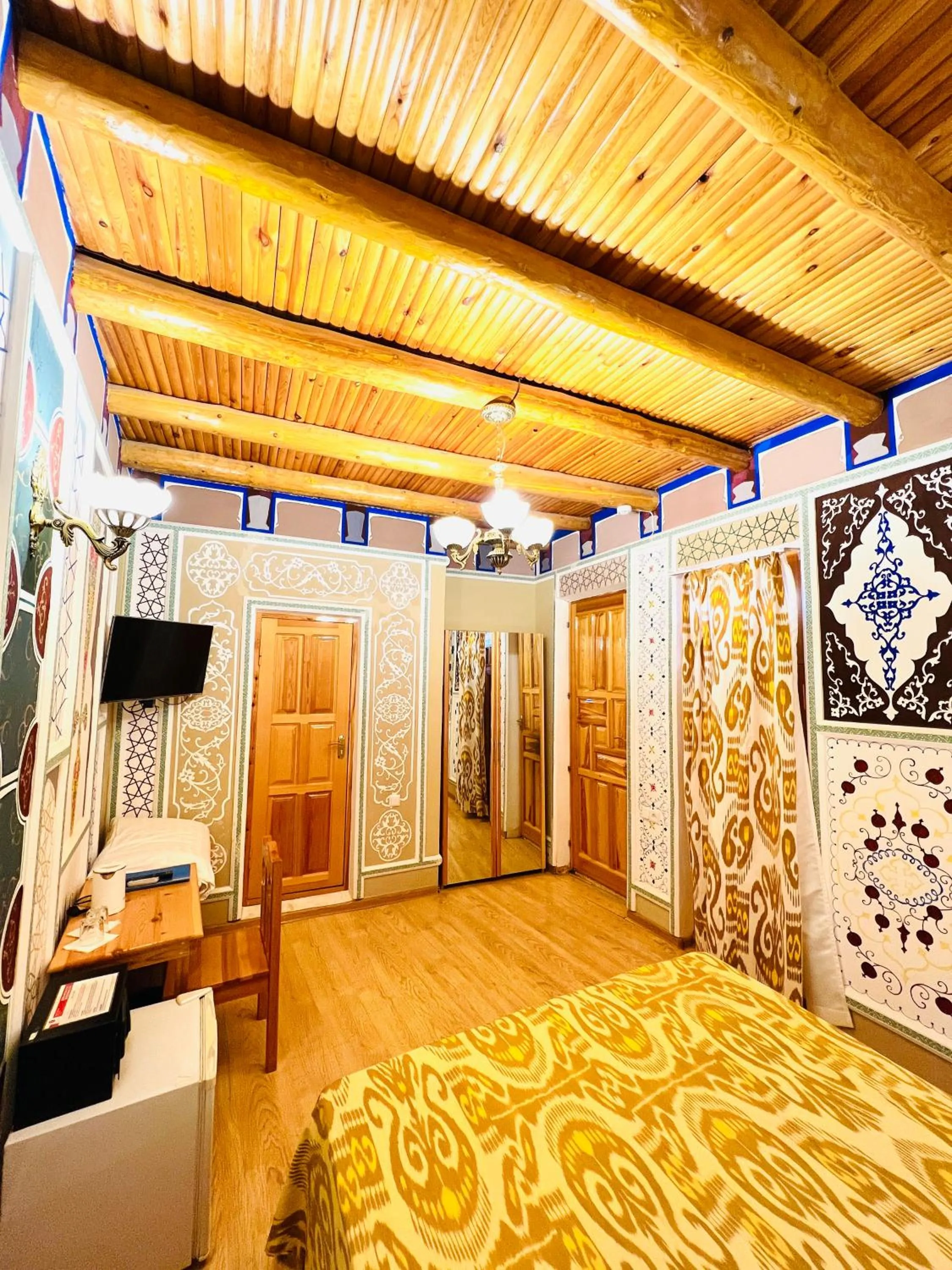 Bed in Komil Bukhara Boutique Hotel