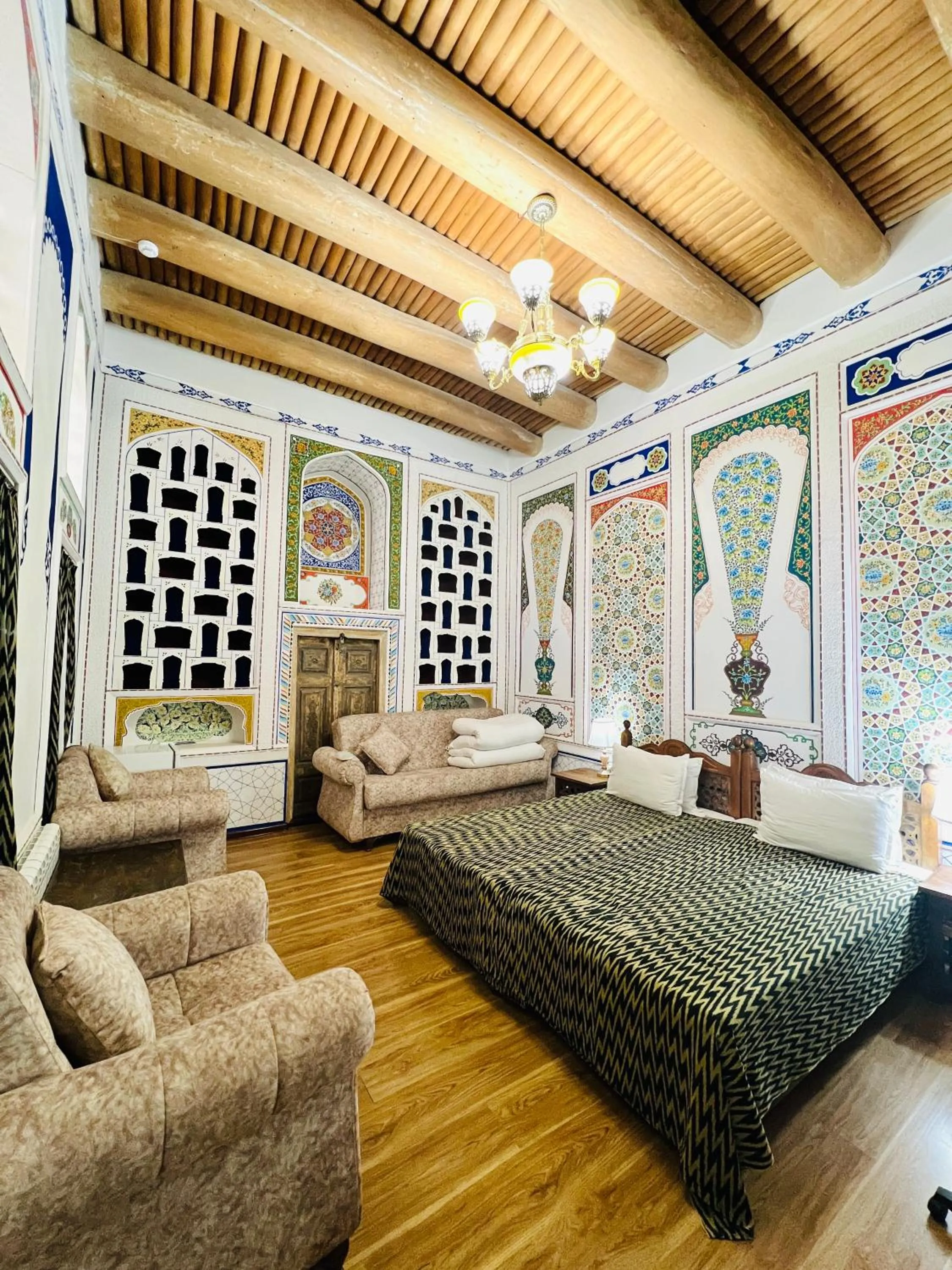 Bed in Komil Bukhara Boutique Hotel