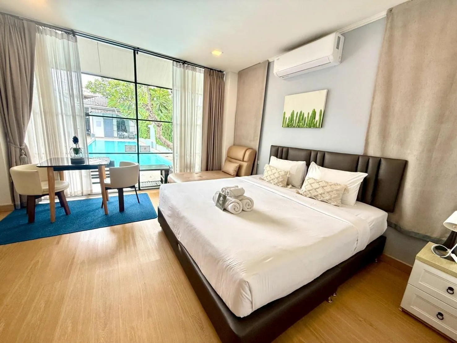 Bed in La Riva Boutique Hotel