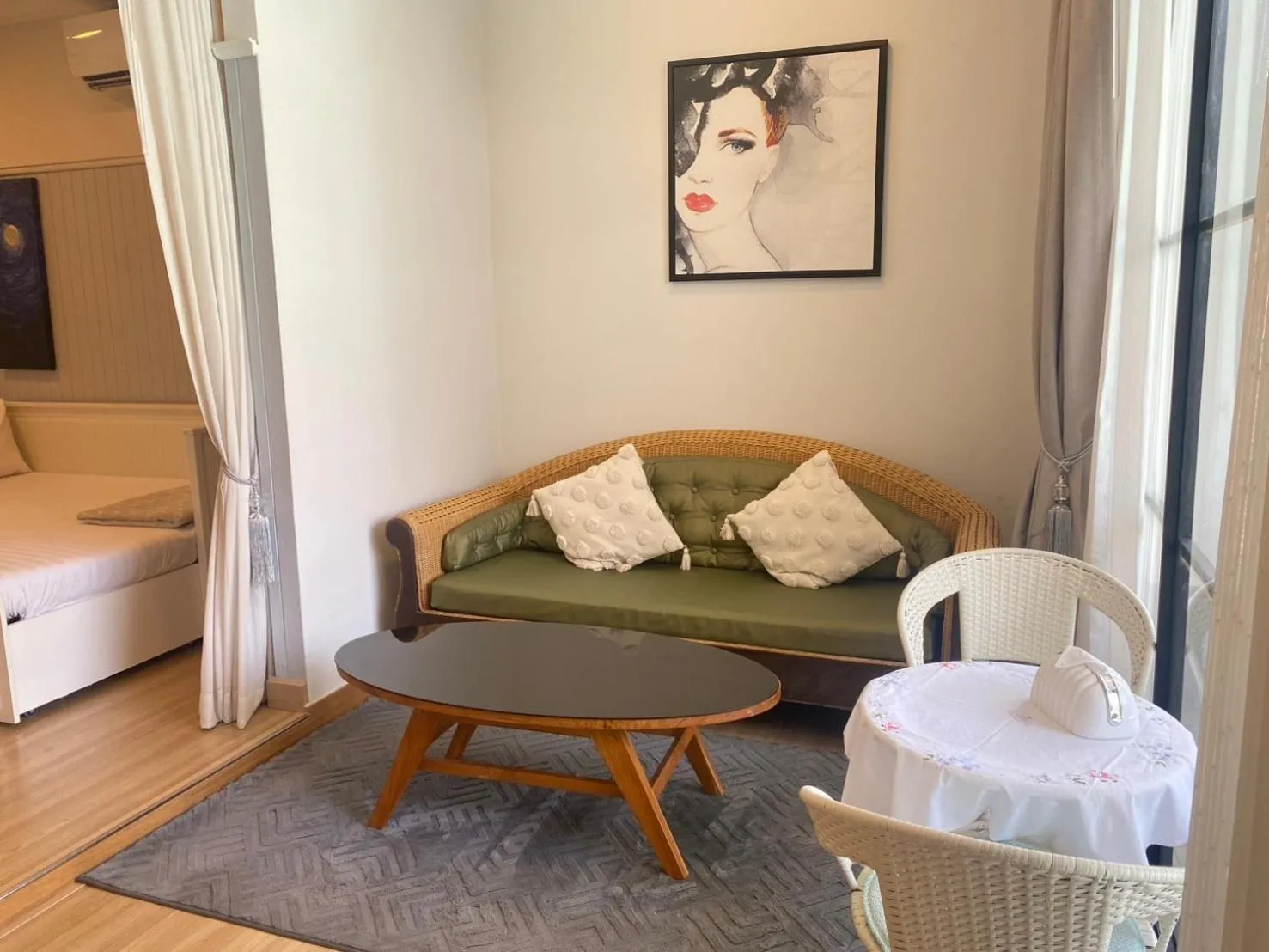 Living room, Bed in La Riva Boutique Hotel