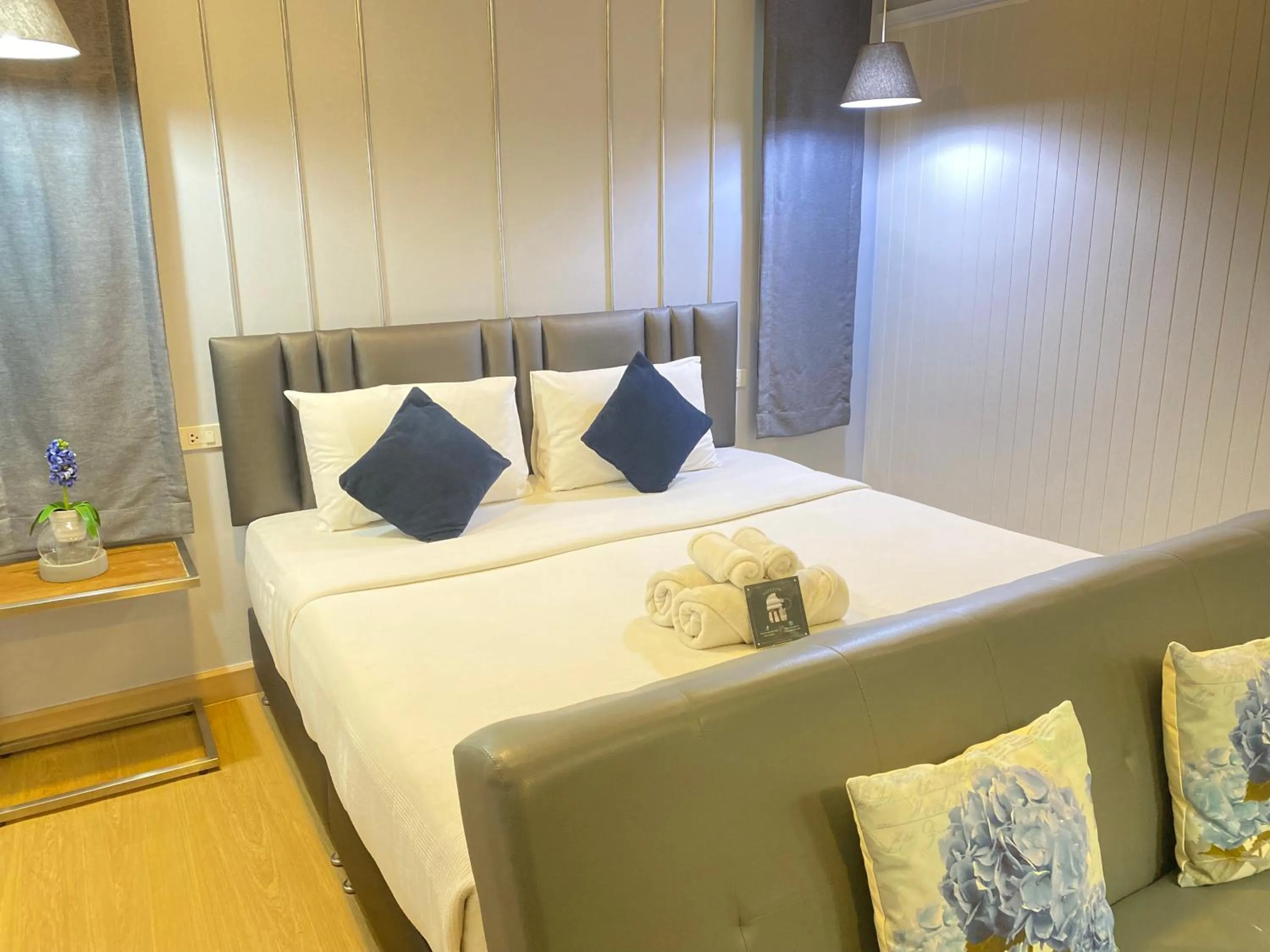 Bed in La Riva Boutique Hotel