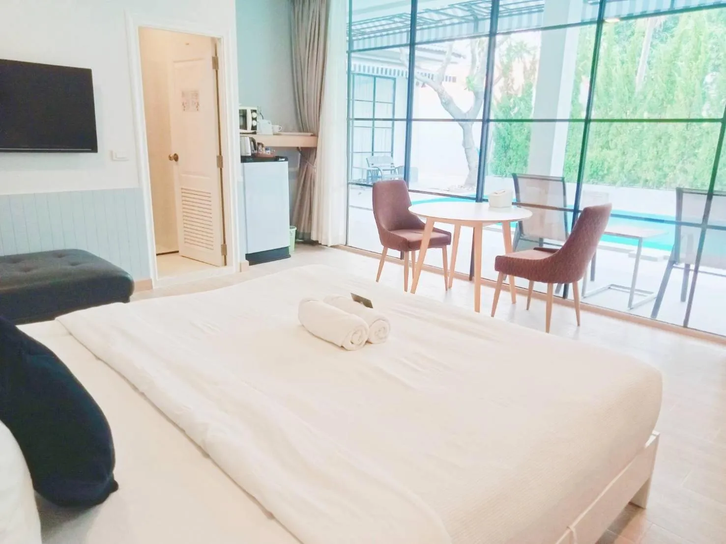 Bed in La Riva Boutique Hotel